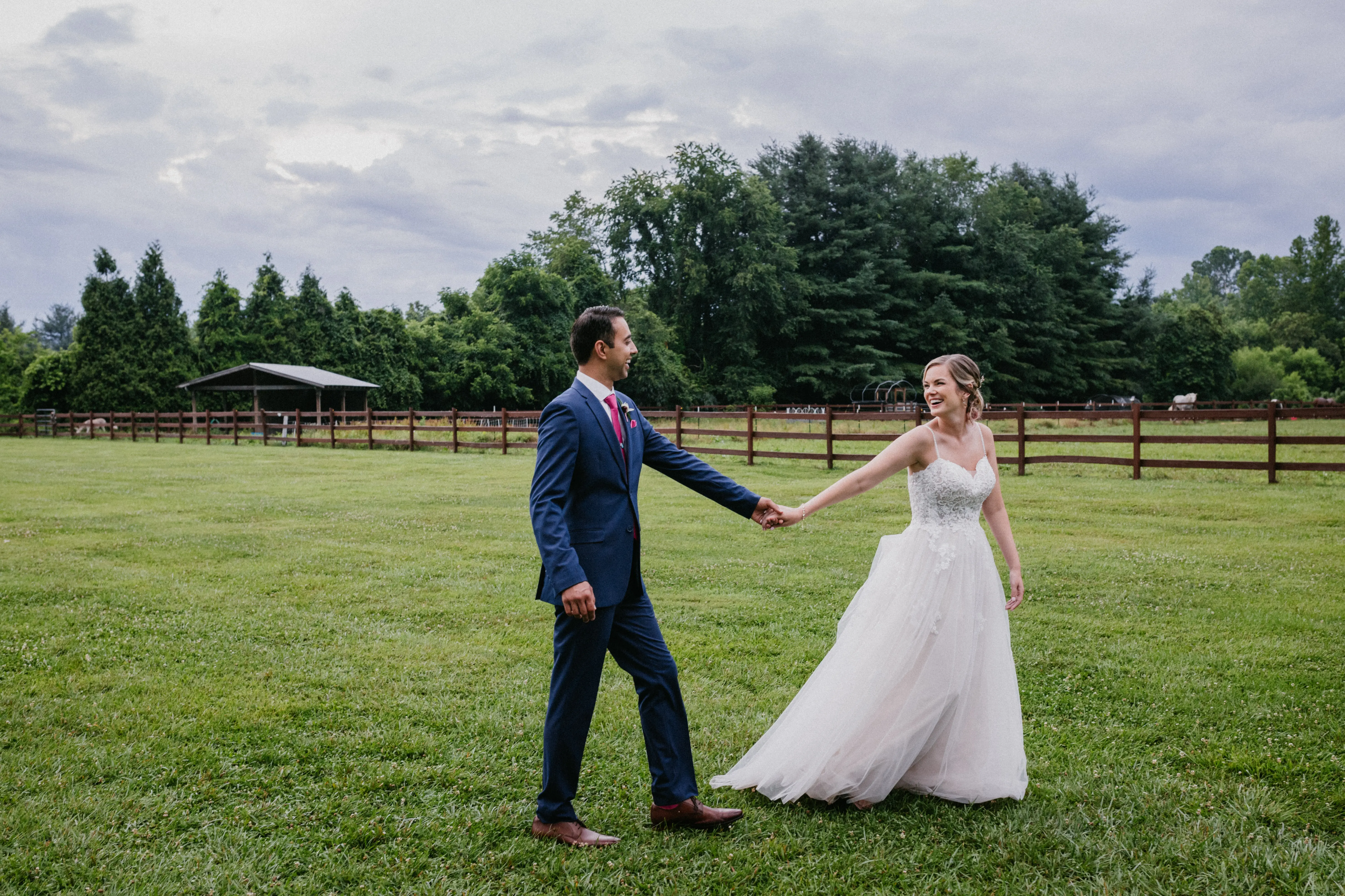 Groom With Bride Wearing A-Line Lace Wedding Dress Marisol By Rebecca Ingram
