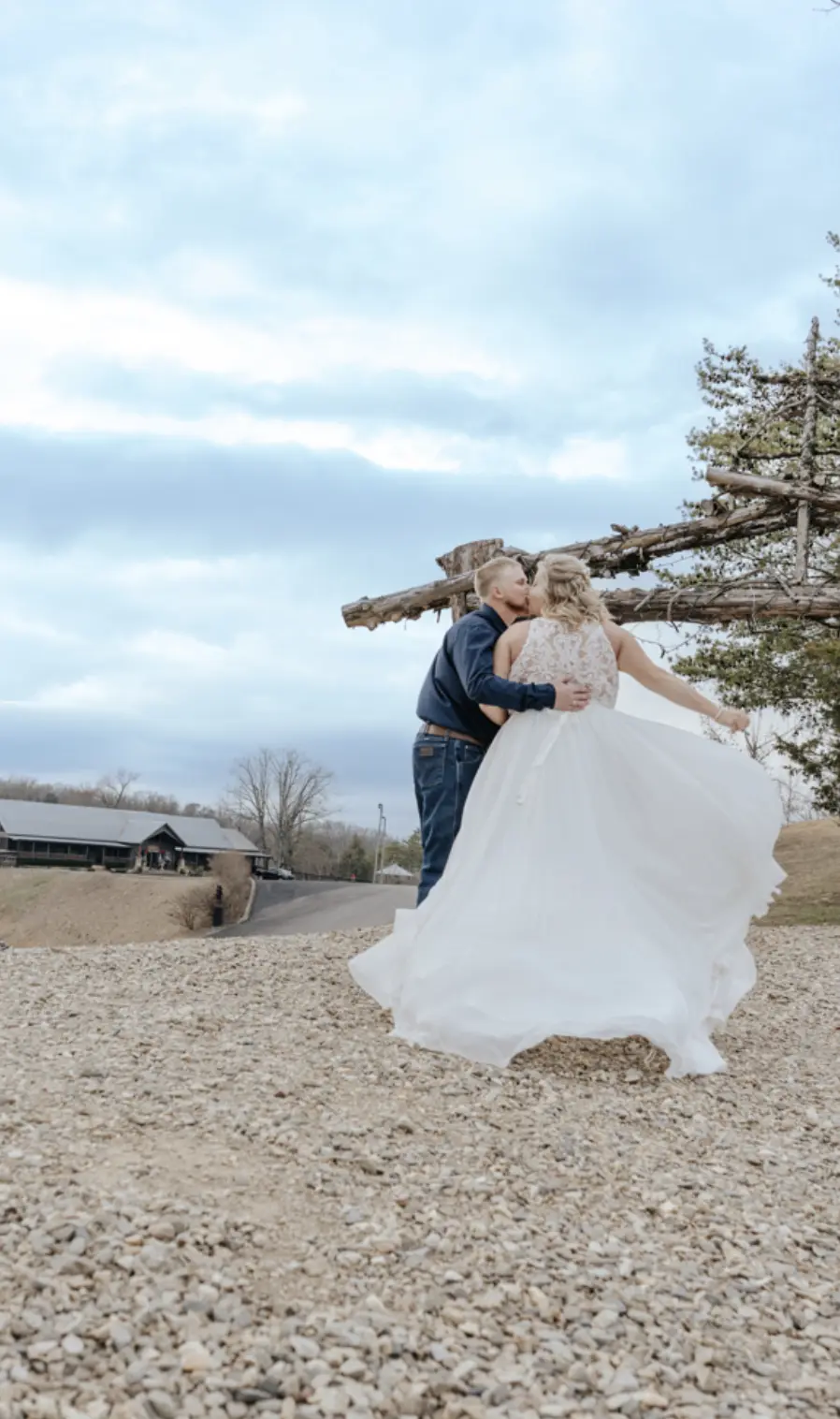 Bride In Chiffon Wedding Dress Called Tasha By Rebecca Ingram With Groom