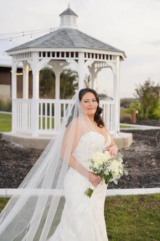 Bride wearing Fiona by Maggie Sottero with her husband