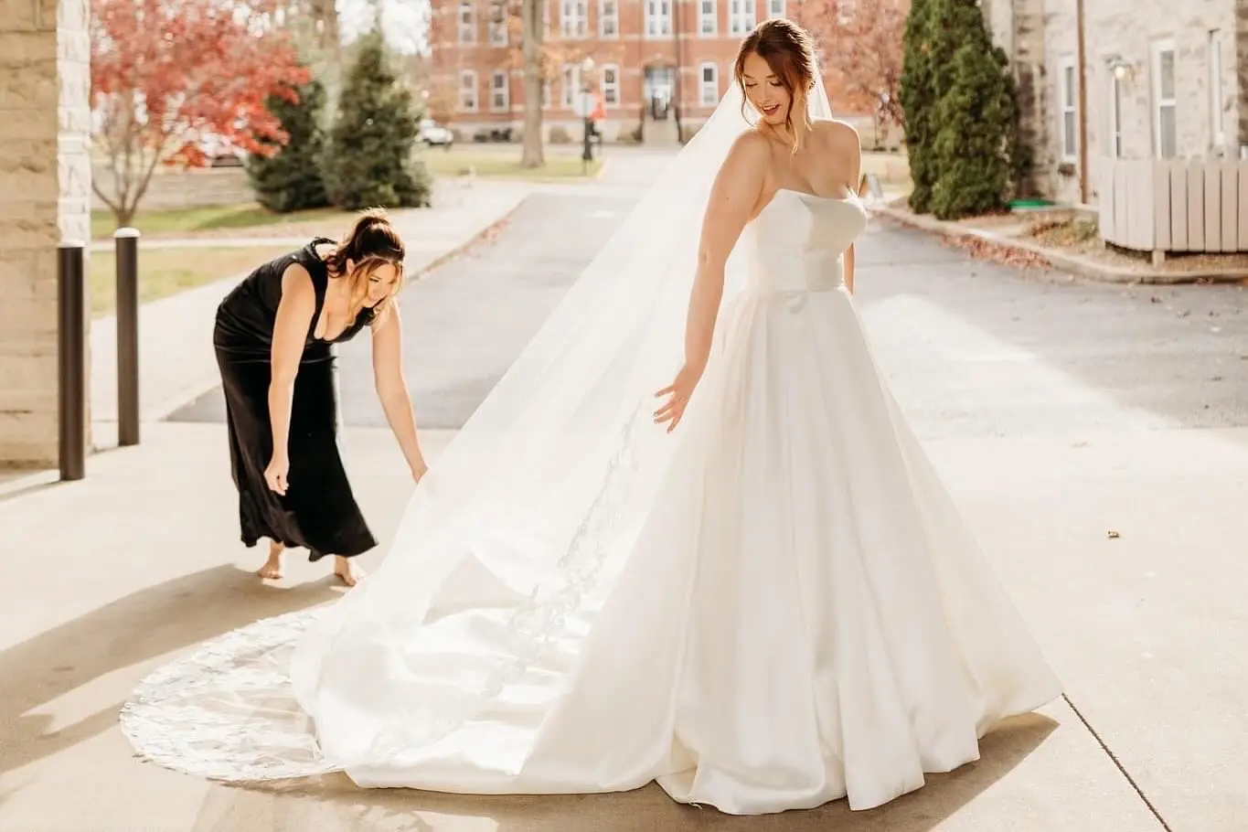 Bride In A Strapless White Ball Gown Wedding Dress Named Selena By Maggie Sottero