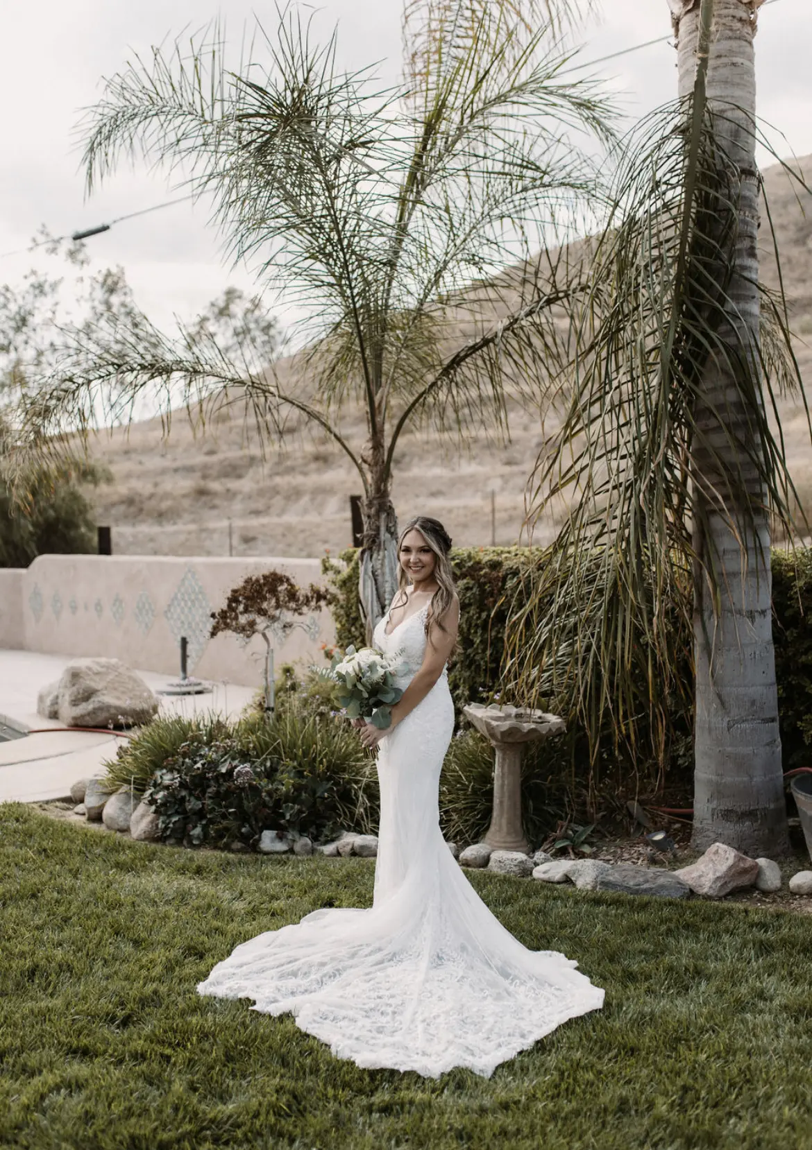 Bride In Beaded Fit-And-Flare Wedding Dress Called Barrett By Sottero And Midgley