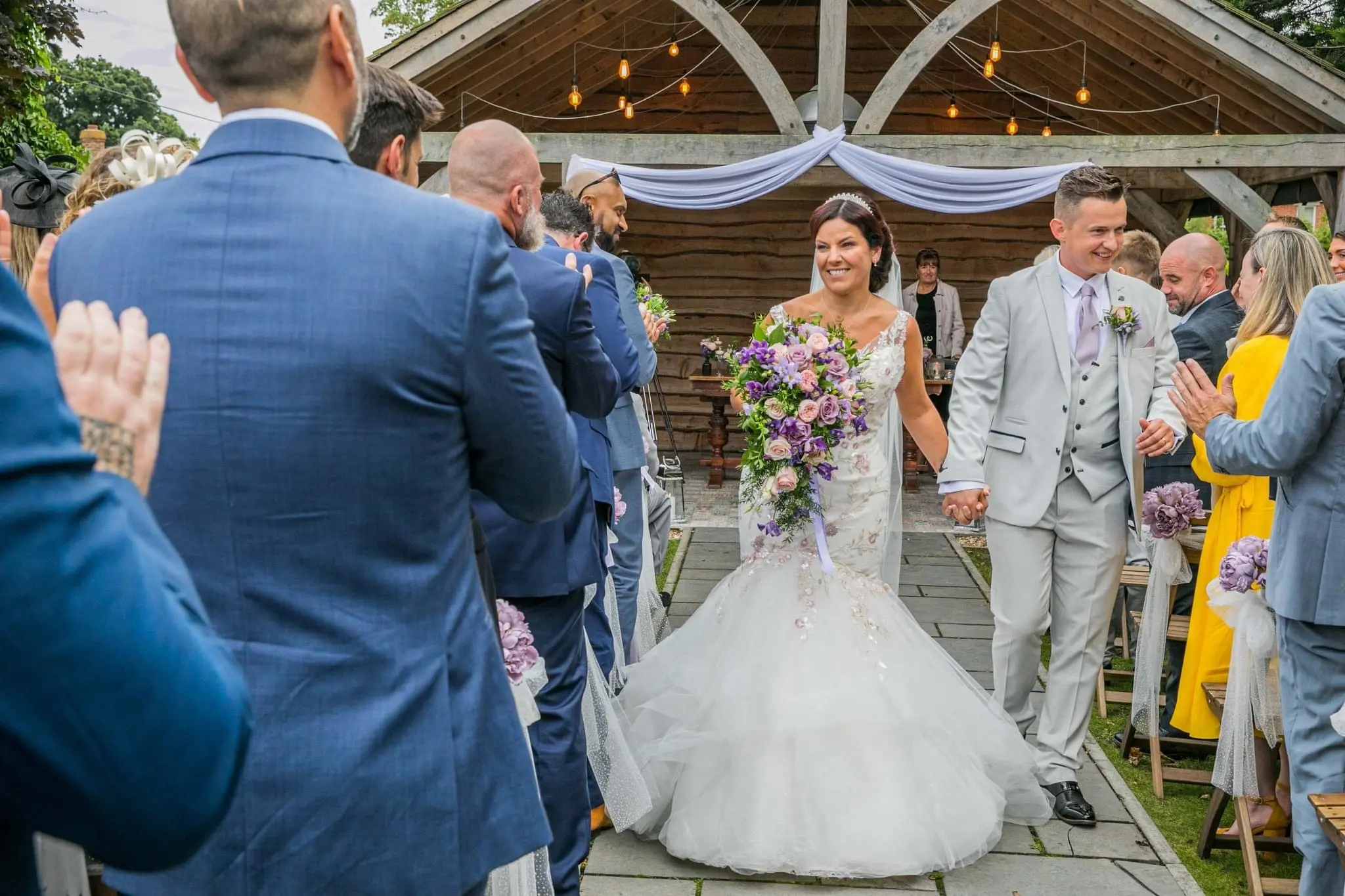 Bride In Colorful Trumpet Kenleigh Sottero Midgley With Guests