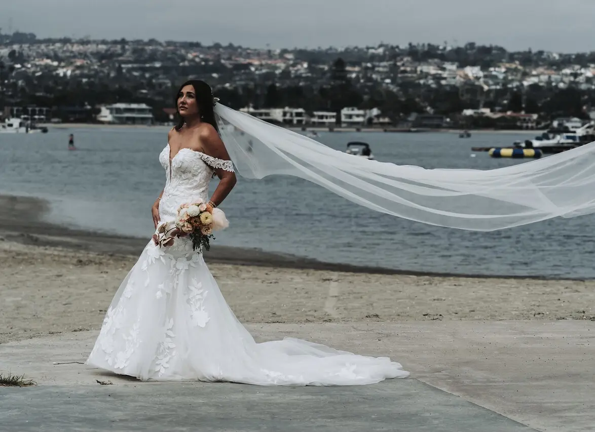 Bride Wearing Mermaid Wedding Dress With Oversized Lace Hattie By Rebecca Ingram