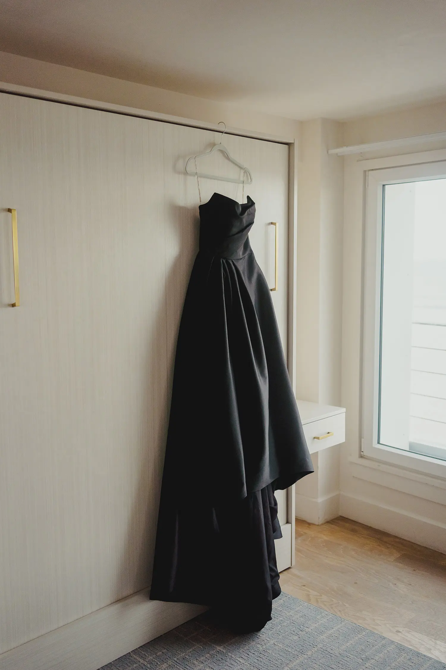 Aspen wedding dress by Sottero and Midgley hanging up