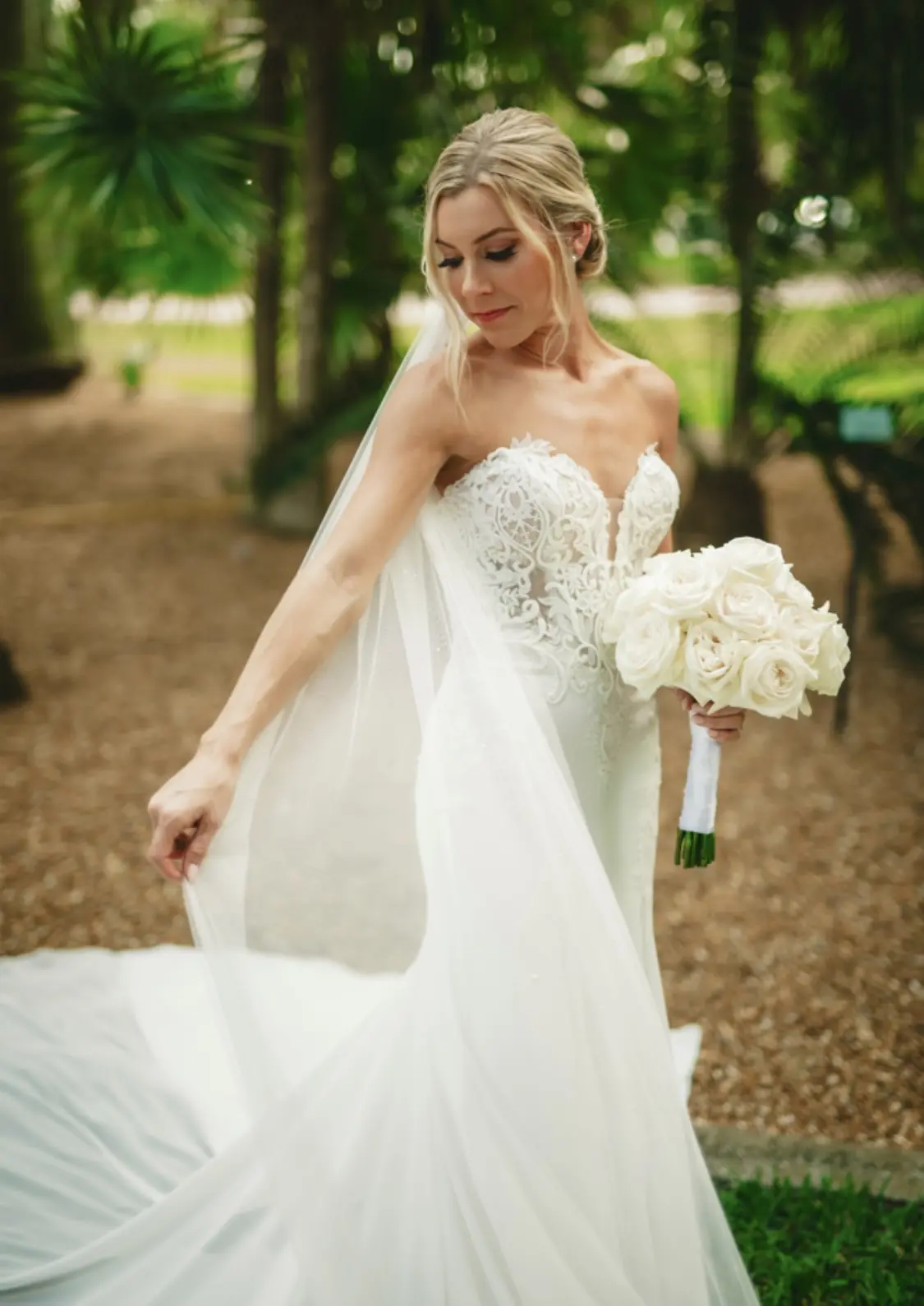 Real Bride in Fit-and-Flare Strapless Chiffon Wedding Gown with Sequined Lace Motifs over Chantilly Lace with Corset Detailing Called Giovannetta by Sottero & Midgley