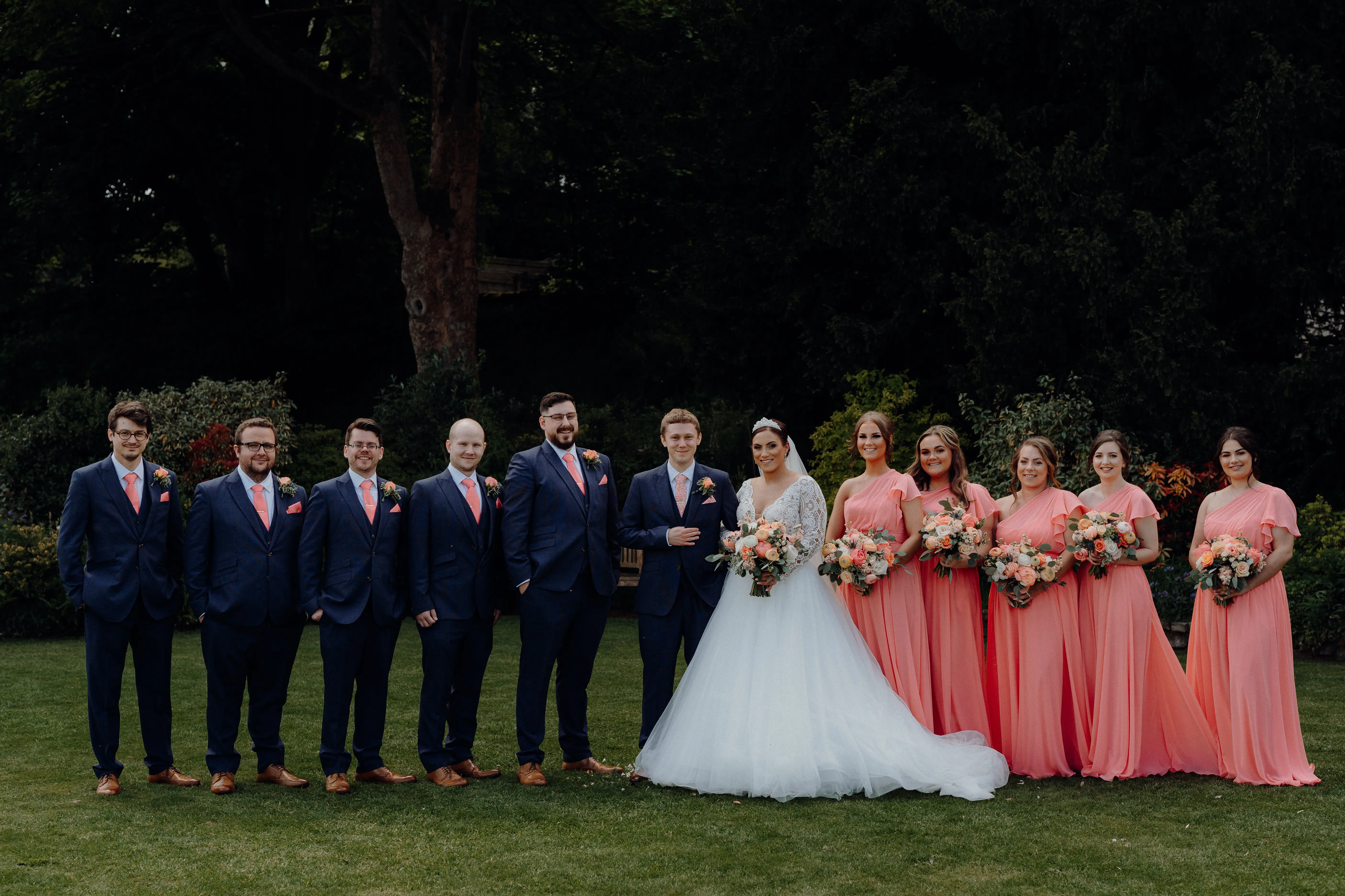 Bridal Party And Groom With Bride In Long Sleeve Lace Ball Gown Wedding Dress Called Mallory Dawn By Maggie Sottero