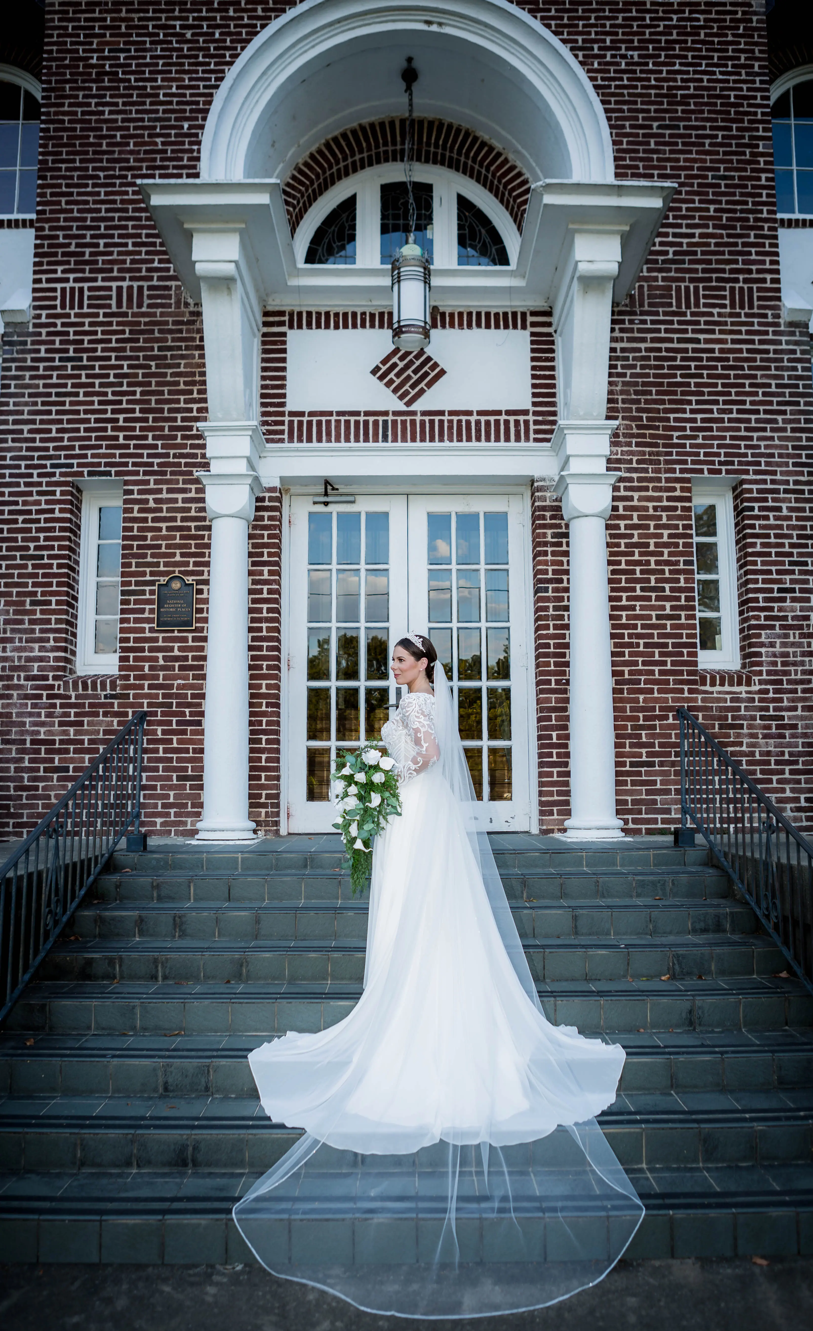 Bride wearing Lorraine Dawn wedding dress by Rebecca Ingram