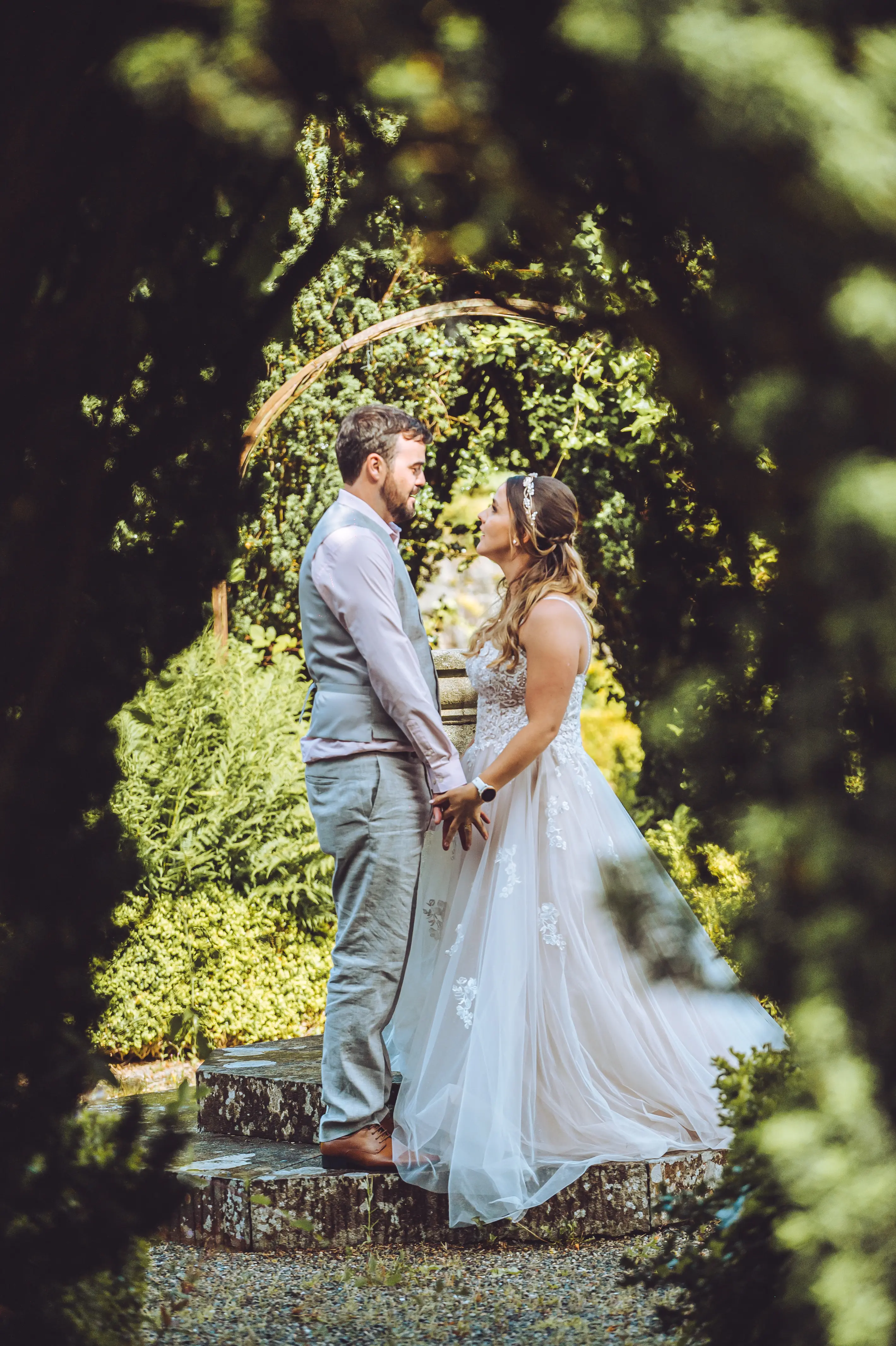 Groom With Bride Wearing A-Line Spaghetti Strap Wedding Dress Marisol By Rebecca Ingram