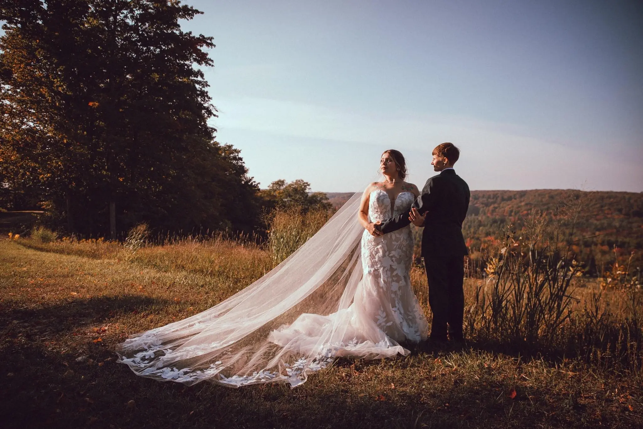 Bride Wearing Lace Fit and Flare Wedding Dress Called Hattie By Rebecca Ingram With Bride