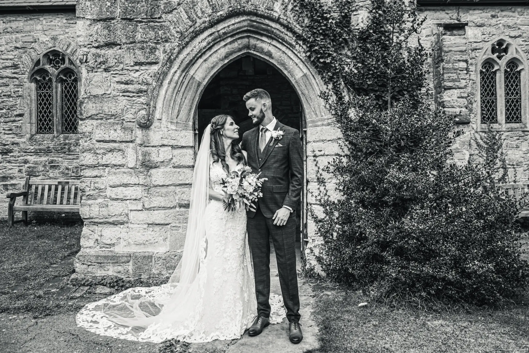 Groom With Bride Wearing Lace Sheath Wedding Dress Tuscany Lynette By Maggie Sottero