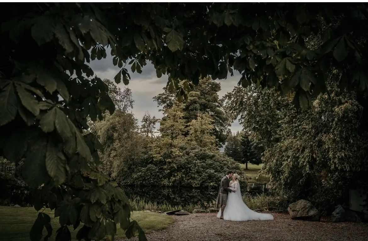 Groom With Bride Wearing Long Sleeved Ball Gown Mallory Dawn By Maggie Sottero