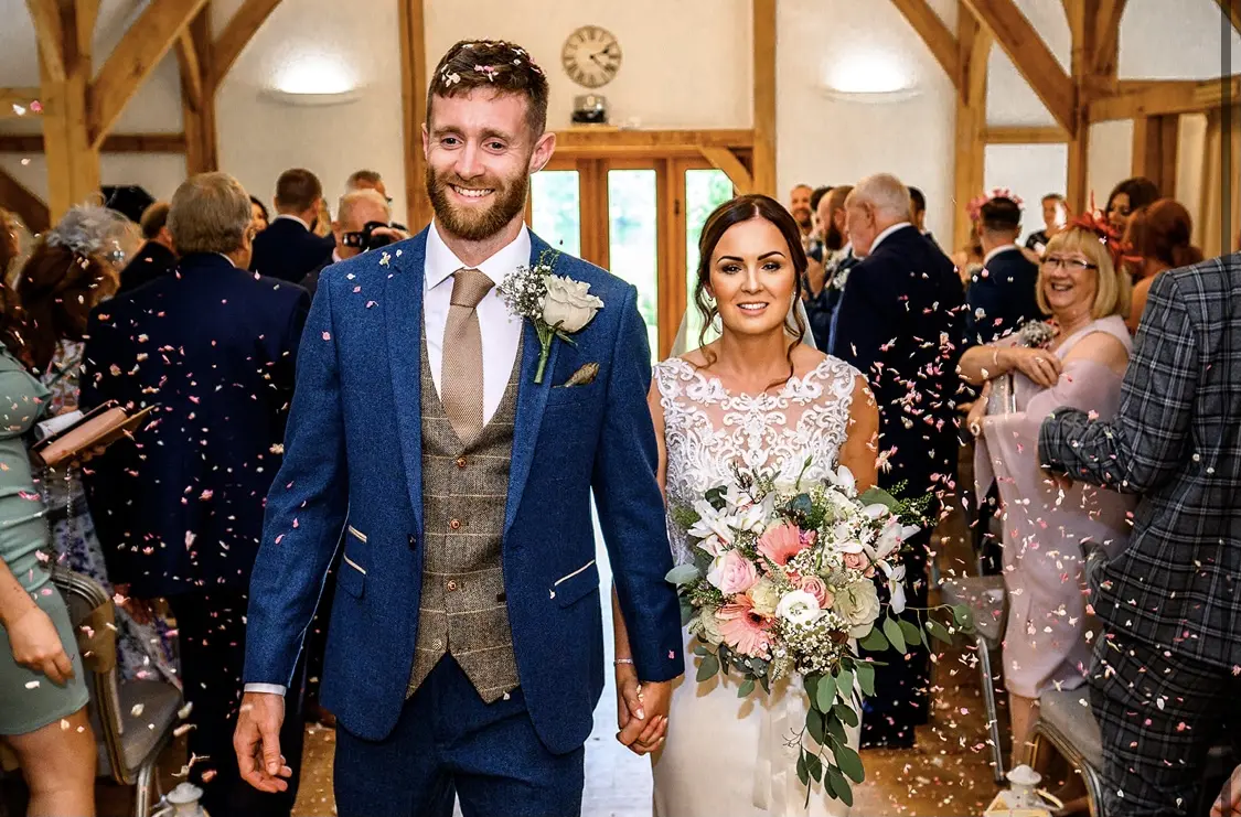 Confetti throw with bride and groom