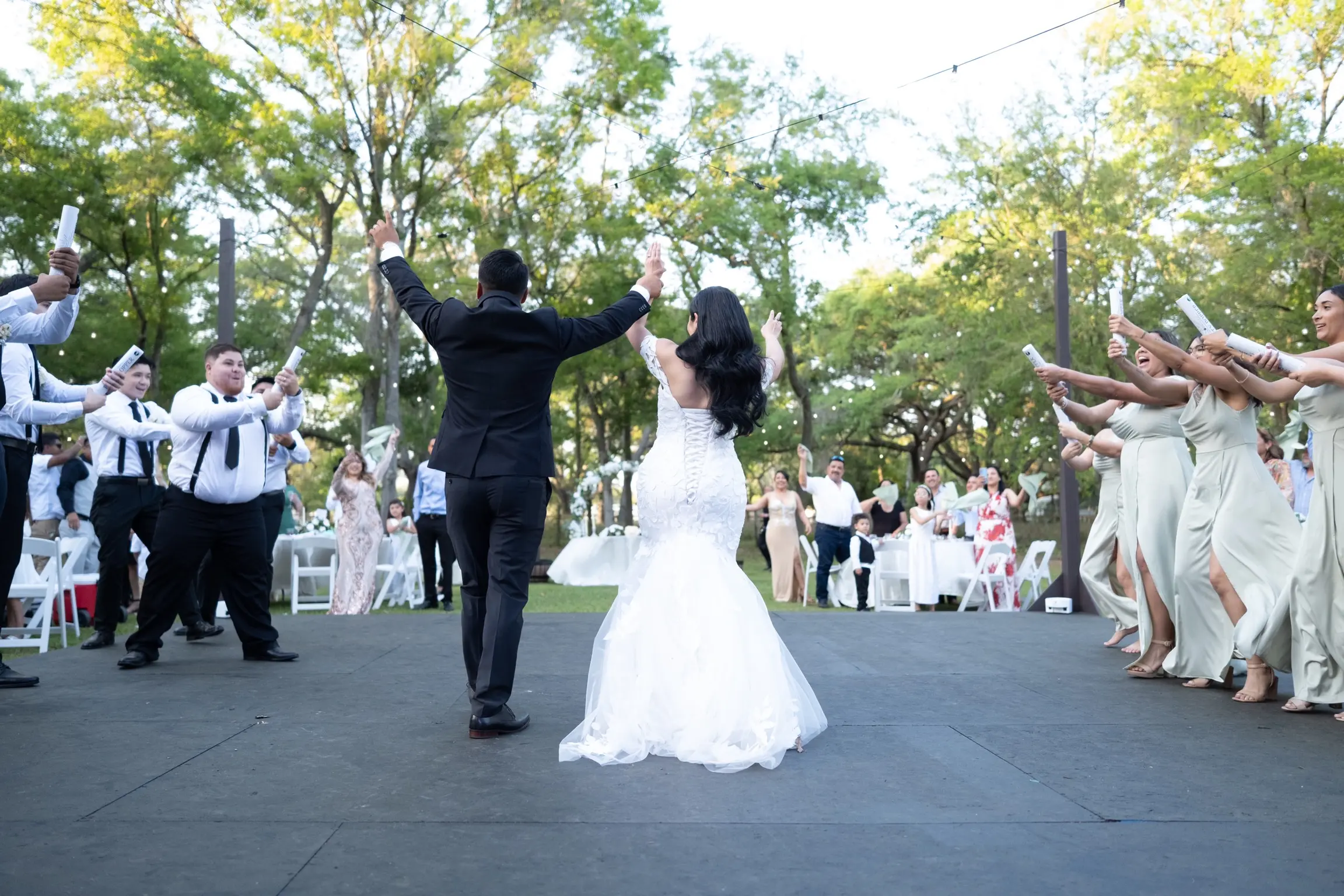 Bride In Lace Mermaid Wedding Dress Called Hattie By Rebecca Ingram With Groom At Reception