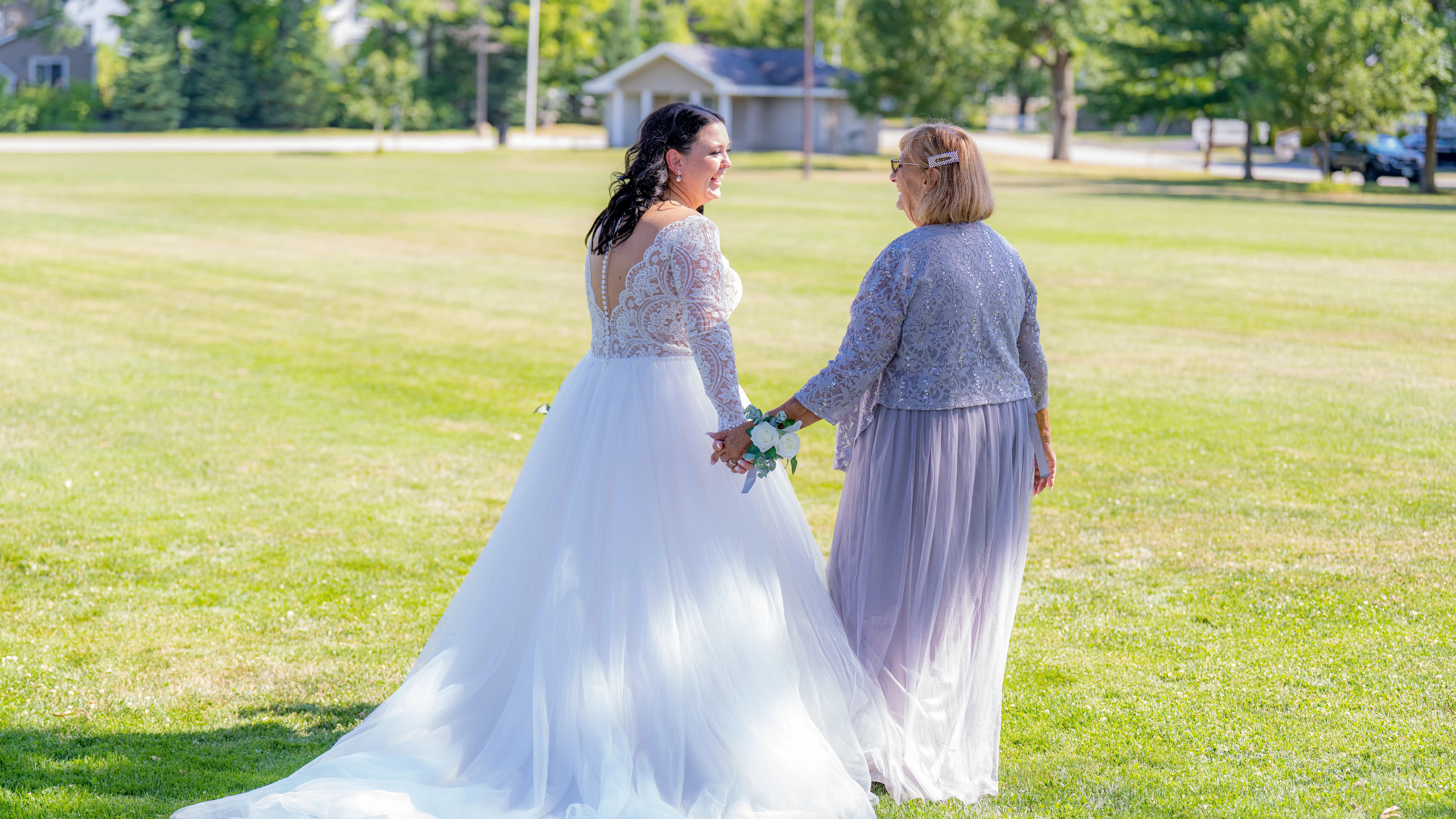 Real Bride in V-neckline, Tulle Skirt Wedding Dress Named Mallory Dawn by Maggie Sottero with Mother