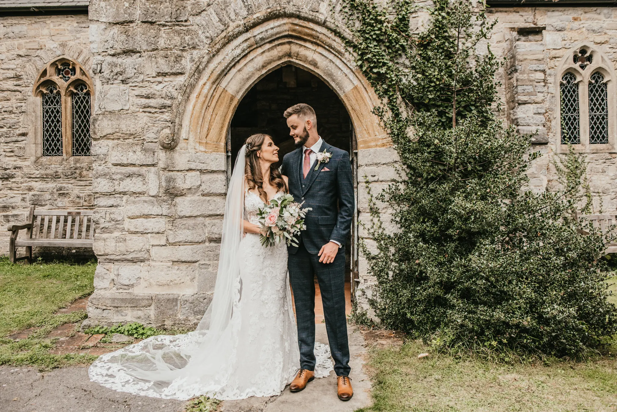 Groom With Bride Wearing Lace Sheath Wedding Dress Tuscany Lynette By Maggie Sottero
