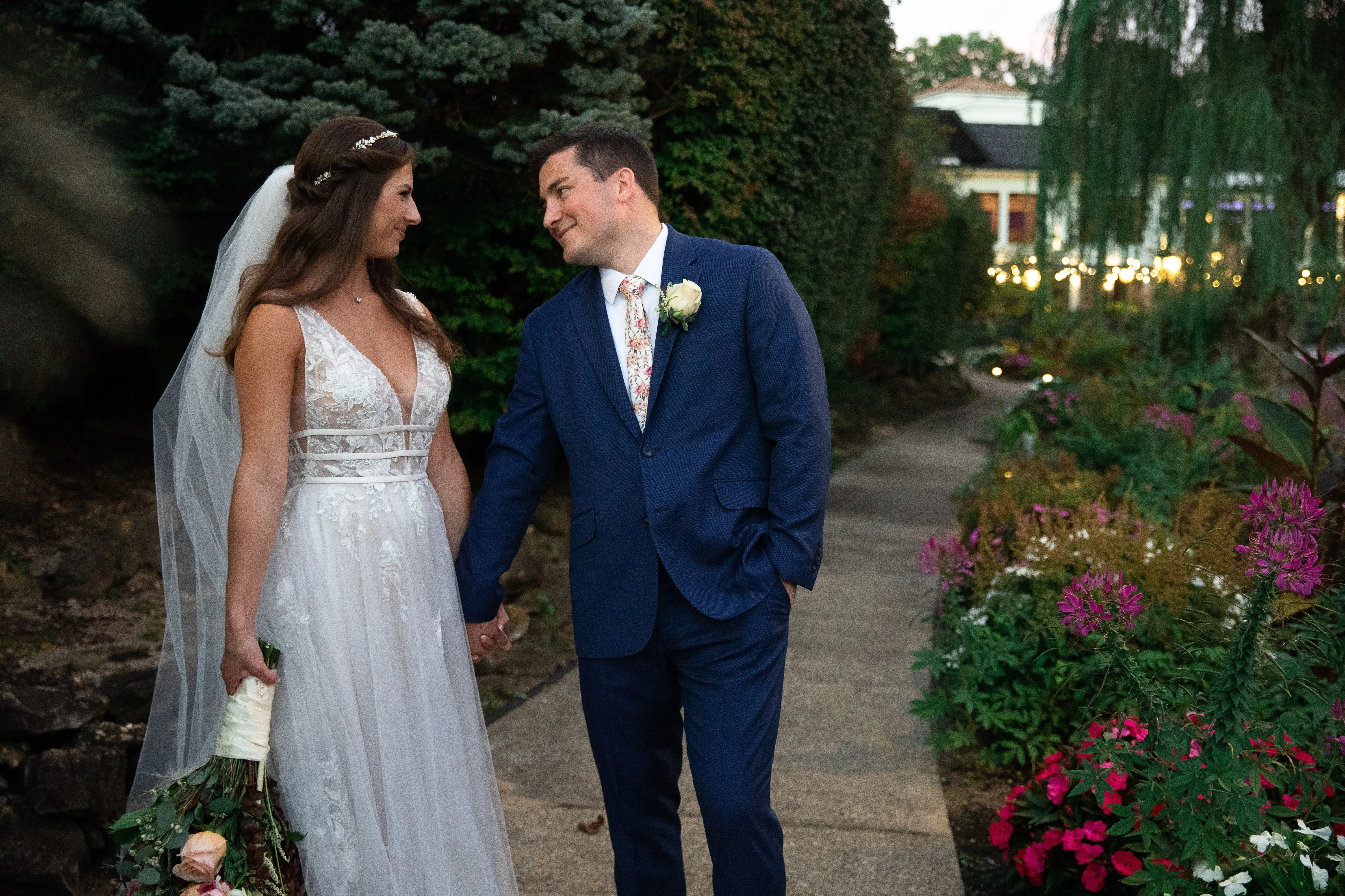 wearing Lace A-line Wedding Dress called Raelynn by Rebecca Ingram and groom