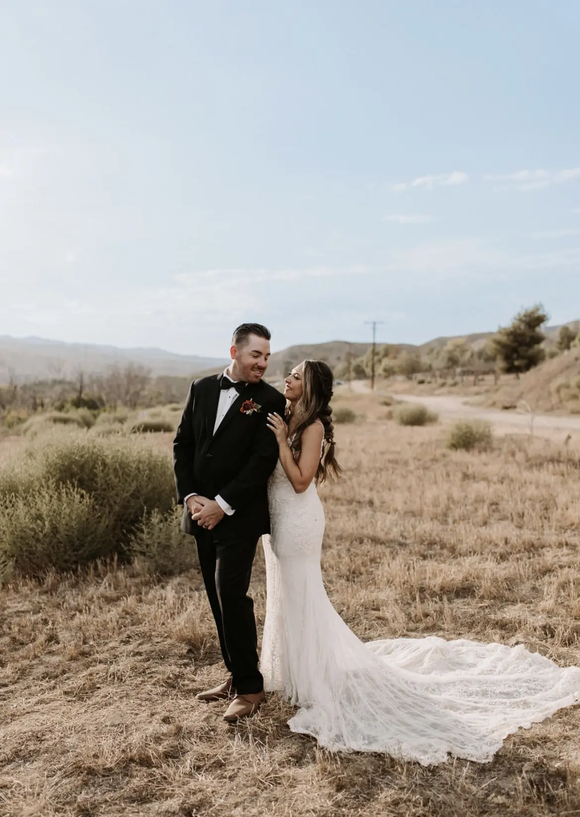 Bride In Beaded Fit-And-Flare Wedding Dress Called Barrett By Sottero And Midgley With Groom