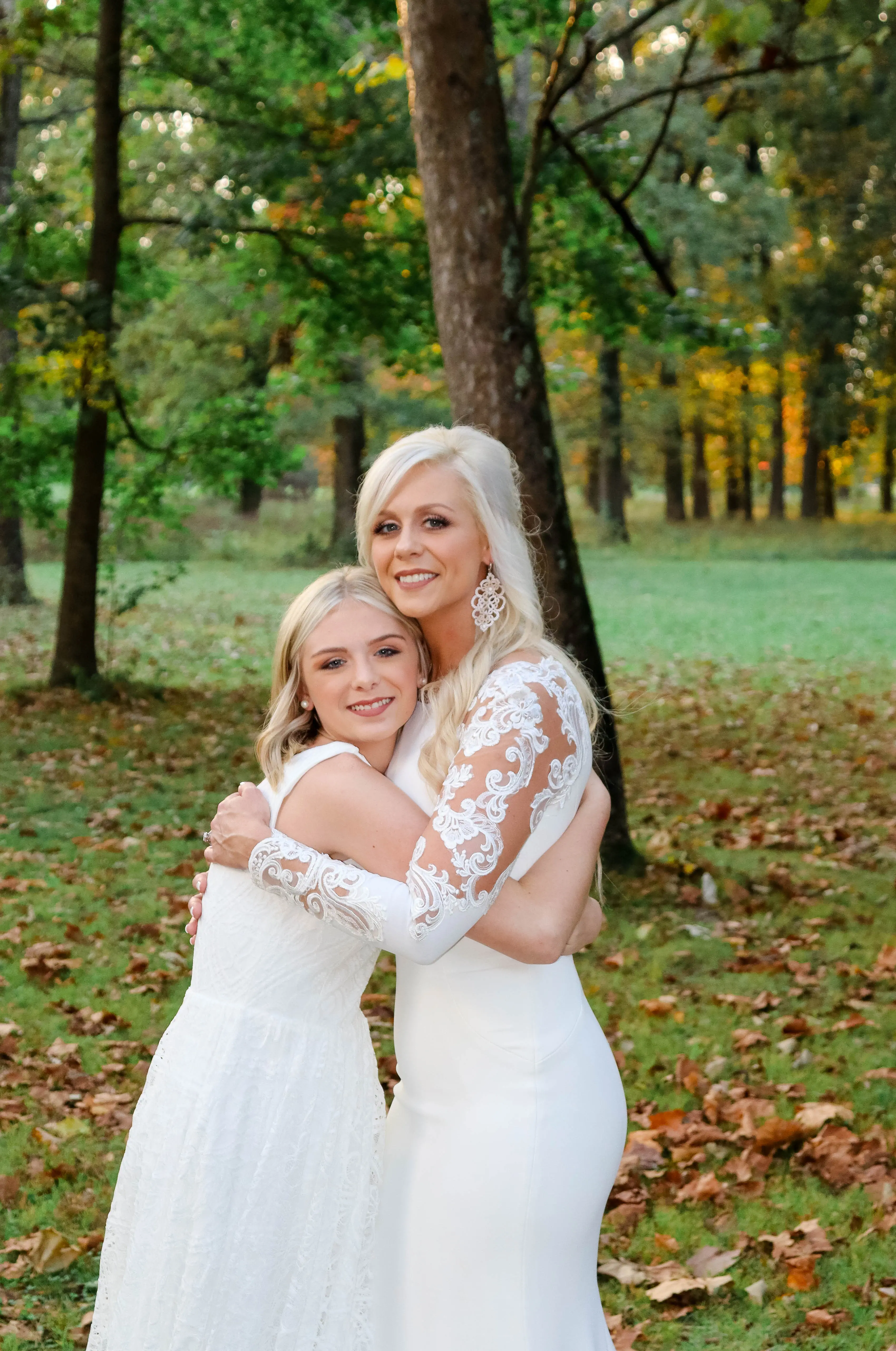 Bride wearing minimalist crepe long sleeve lace sheath wedding dress