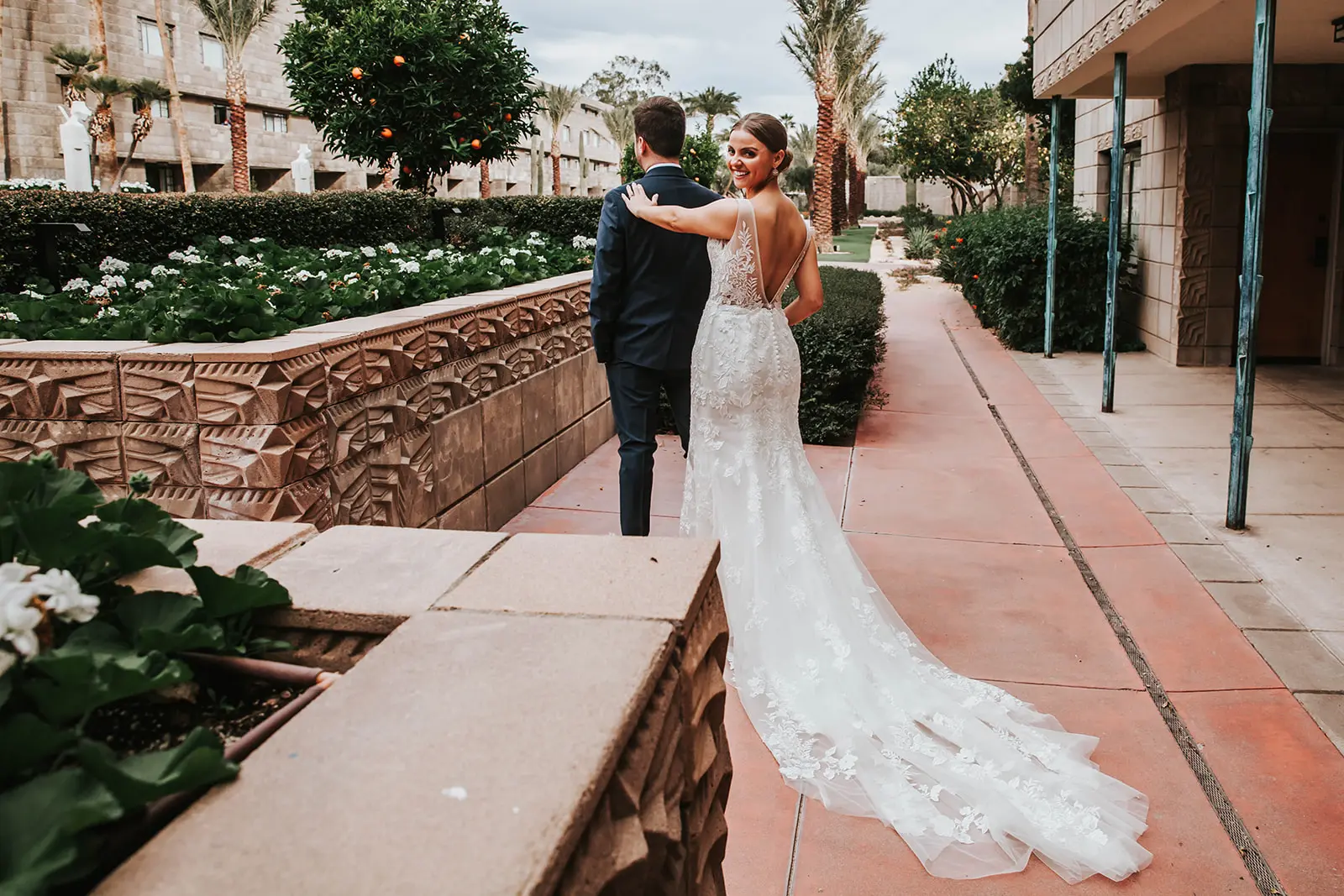 Bride In Floral Fit-And-Flare Wedding Dress Called Greenley By Maggie Sottero
