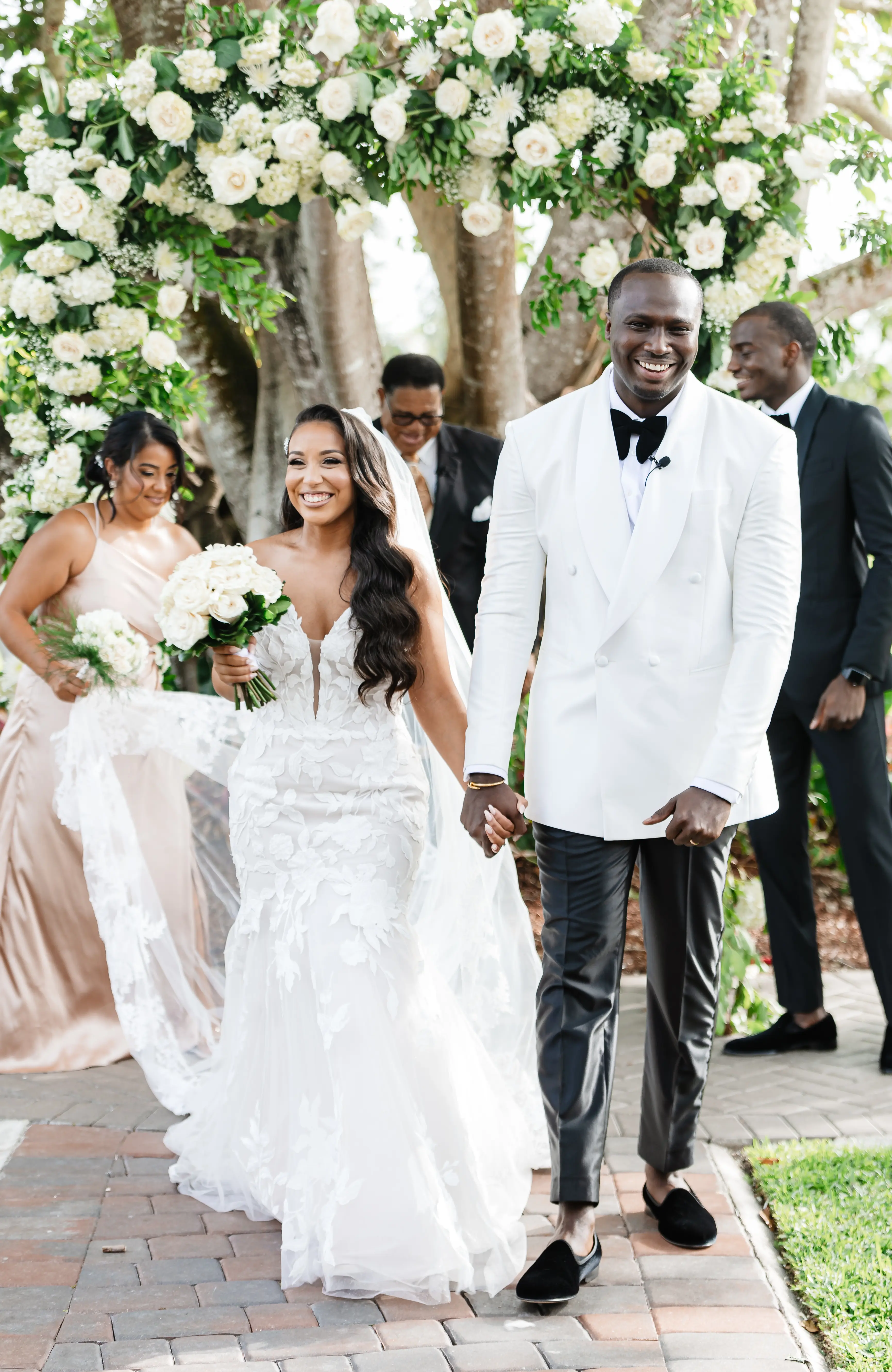 Real Bride in Strapless Mermaid Bridal Gown in Oversized Lace with Floral Lace Motifs over Sparkle Tulle and Sweetheart Neckline called Hattie by Rebecca Ingram