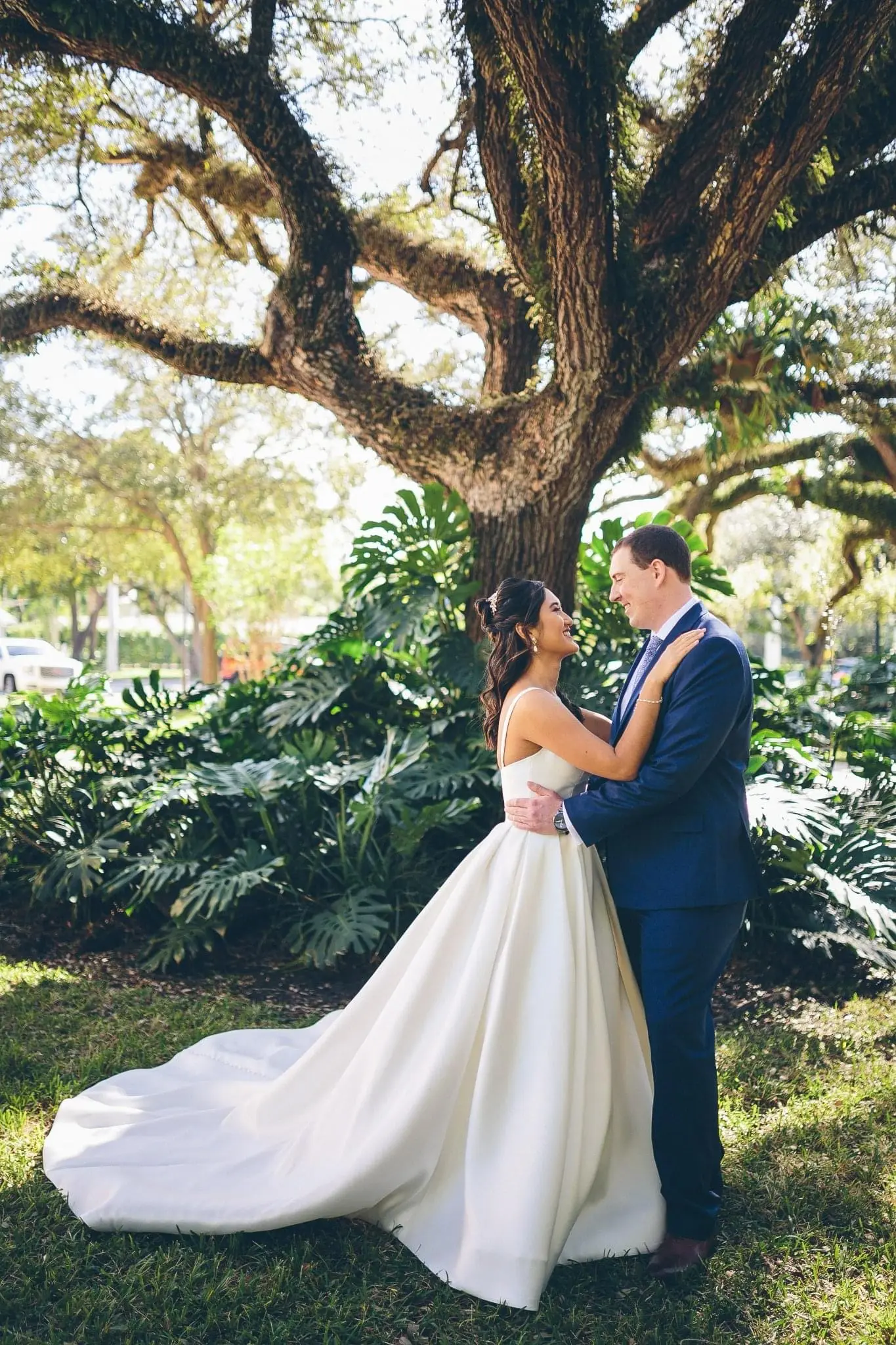 Groom Smiles With Bride In Soft Ball Gown Wedding Dress Called Selena By Maggie Sottero
