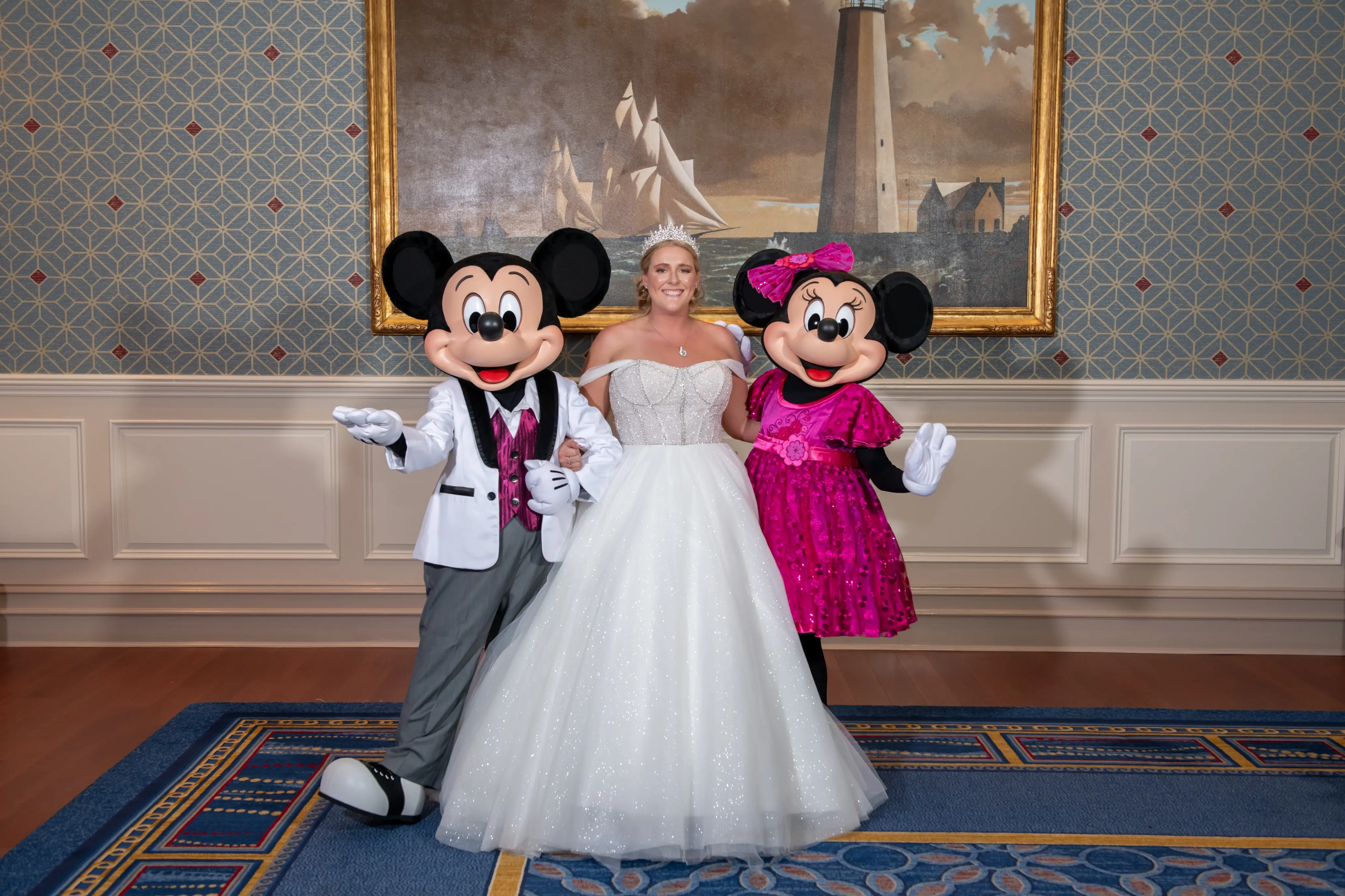 Bride wearing Elton wedding dress by Sottero and Midgley with Minnie and Mickey Mouse