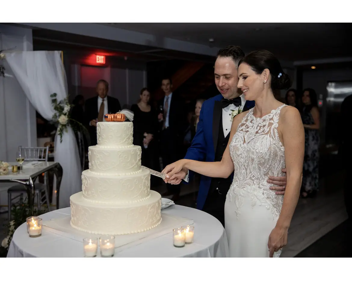 Groom With Bride Wearing Halter Style Crepe Wedding Dress Audrina By Maggie Sottero