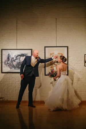 Bride In Floral Lace Bridal Gown Named Lettie By Rebecca Ingram Bride Dancing With Groom