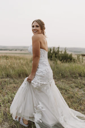 Bride wearing strapless mermaid wedding dress