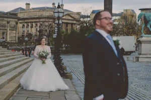 Bride Wearing Dreamy Long Sleeve Ballgown Wedding Dress Called Mallory Dawn By Maggie Sottero Sees Groom From Behind