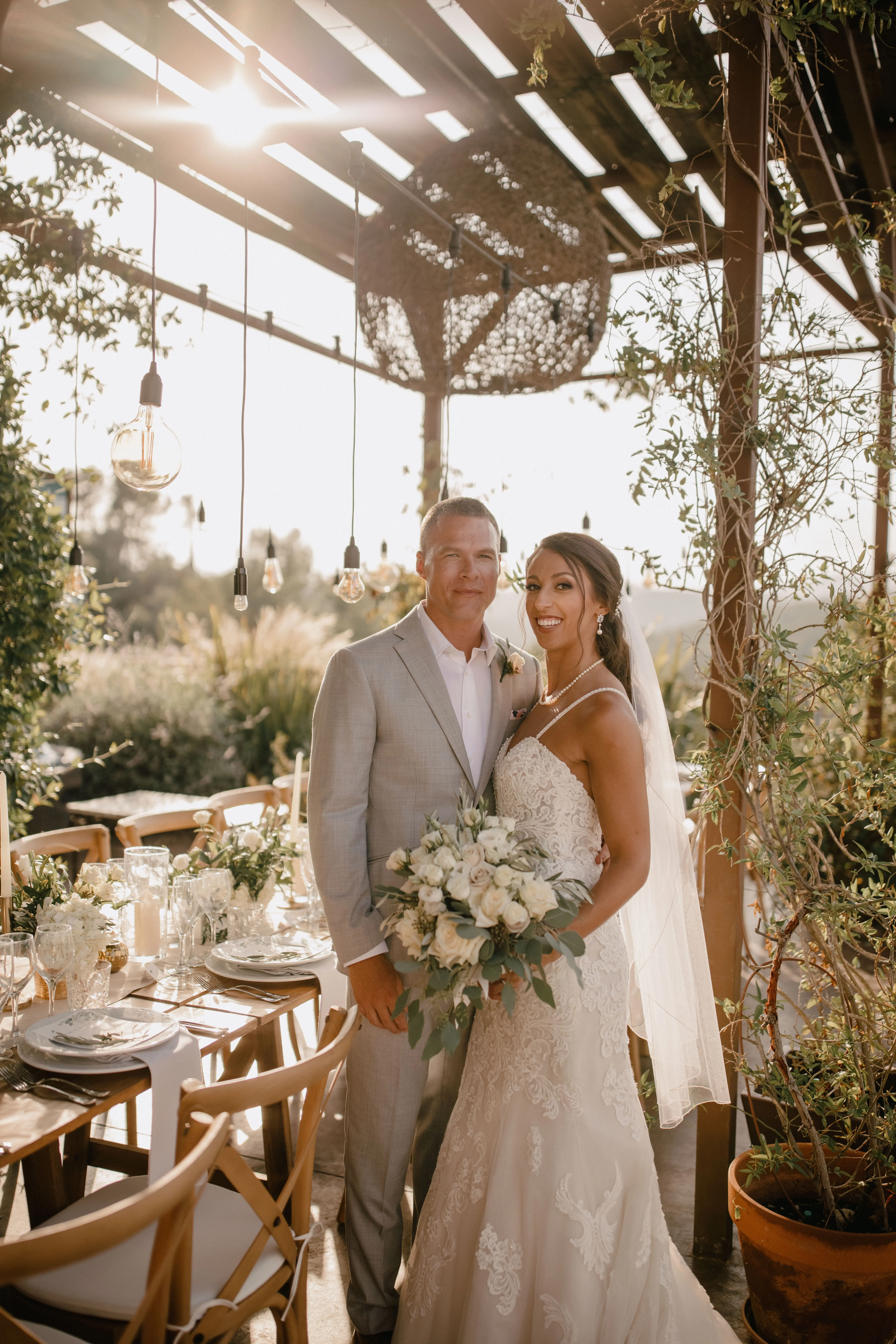 Groom with Bride in Sparkly Lace Fit-and-Flare Bridal Dress Called Fiona by Maggie Sottero
