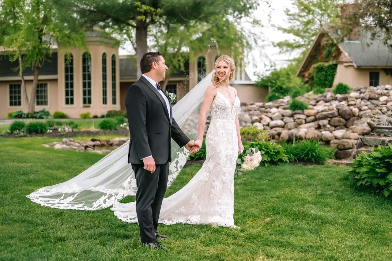 Bride In Sheath Illusion Bodice Tuscany Lynette Maggie Sottero With Groom