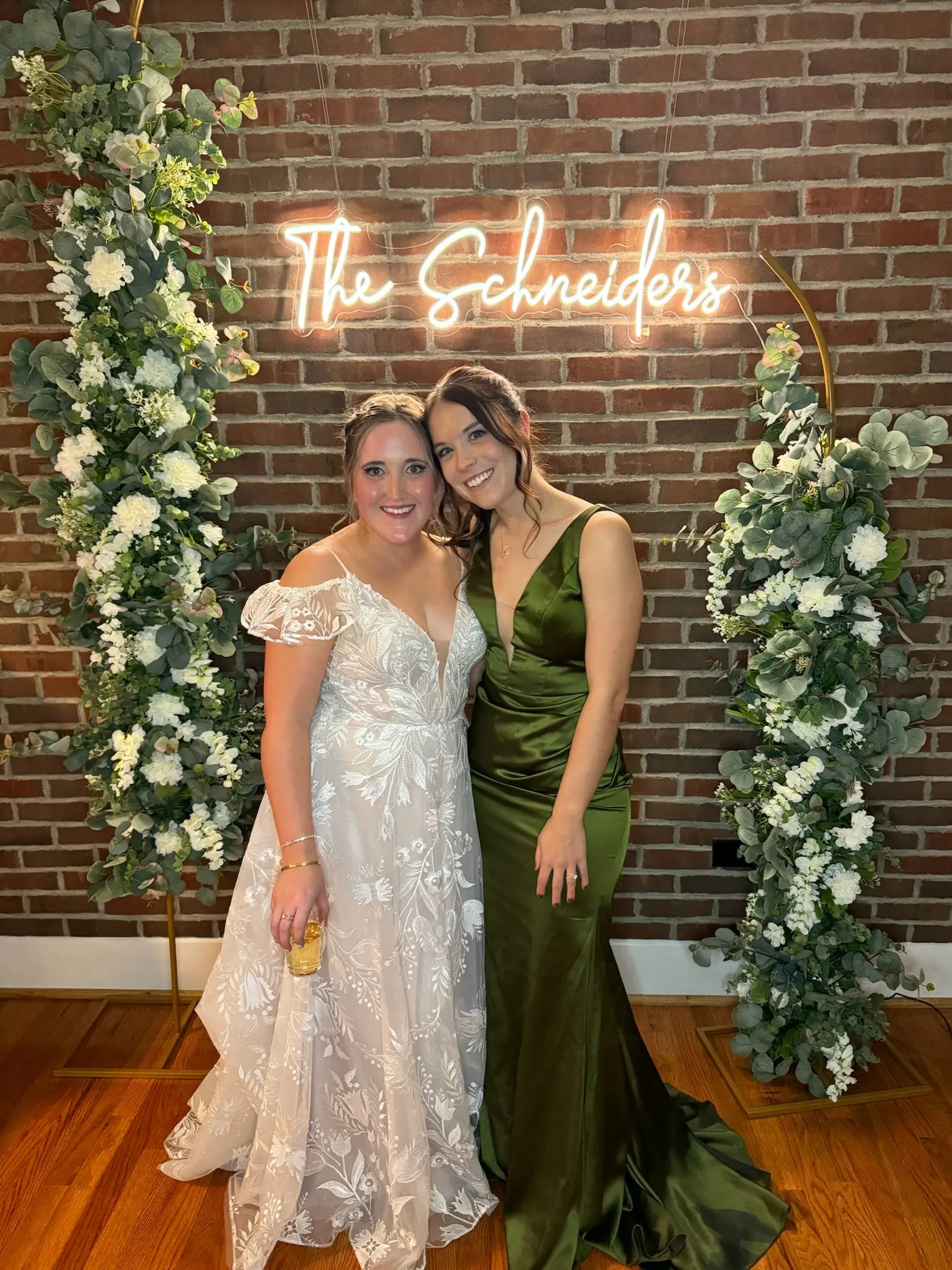 Bride wearing Keisha wedding dress by Maggie Sottero with a friend