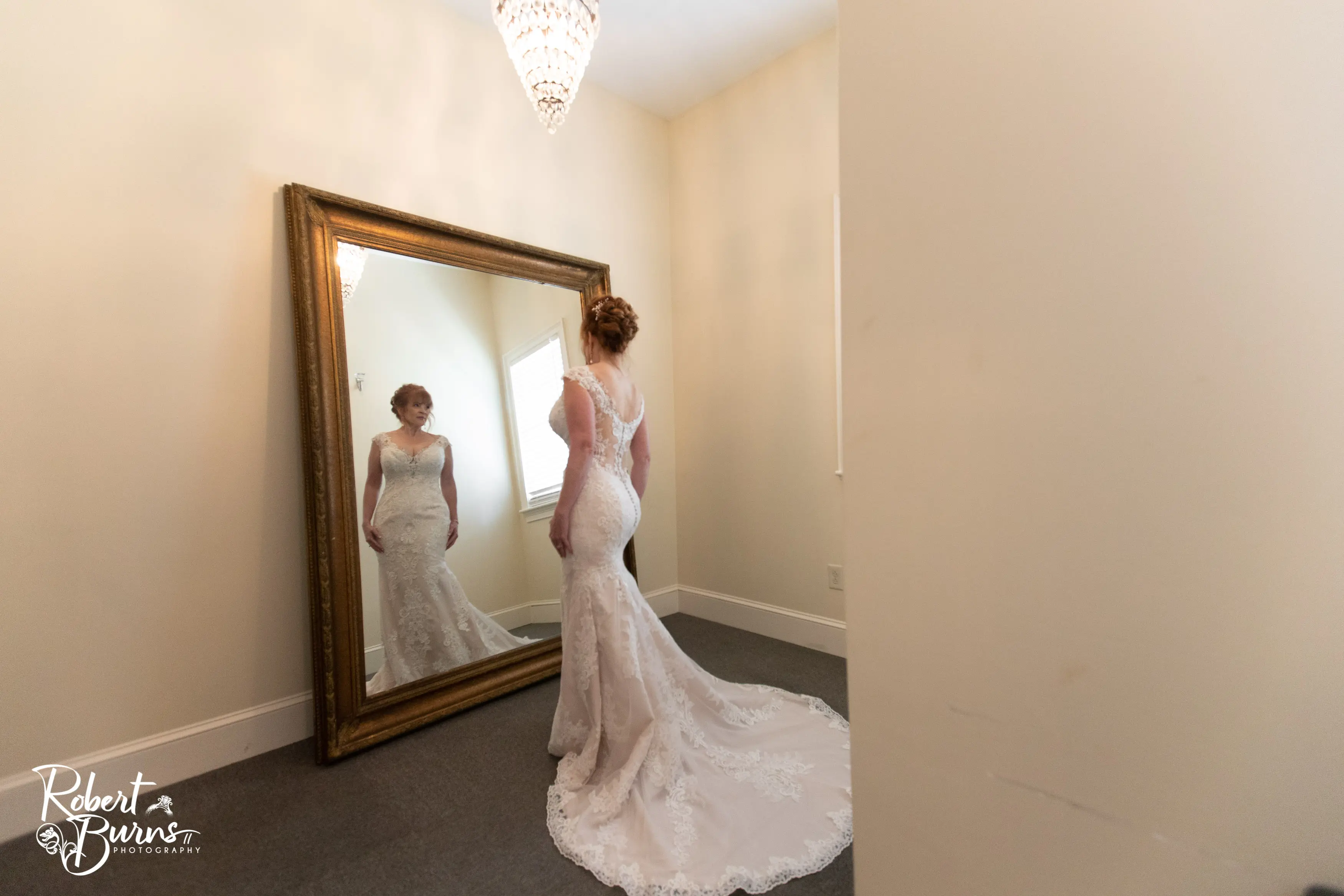 Bride Getting Ready Wearing a Lace Bridal Dress Called Daphne Lynette by Rebecca Ingram