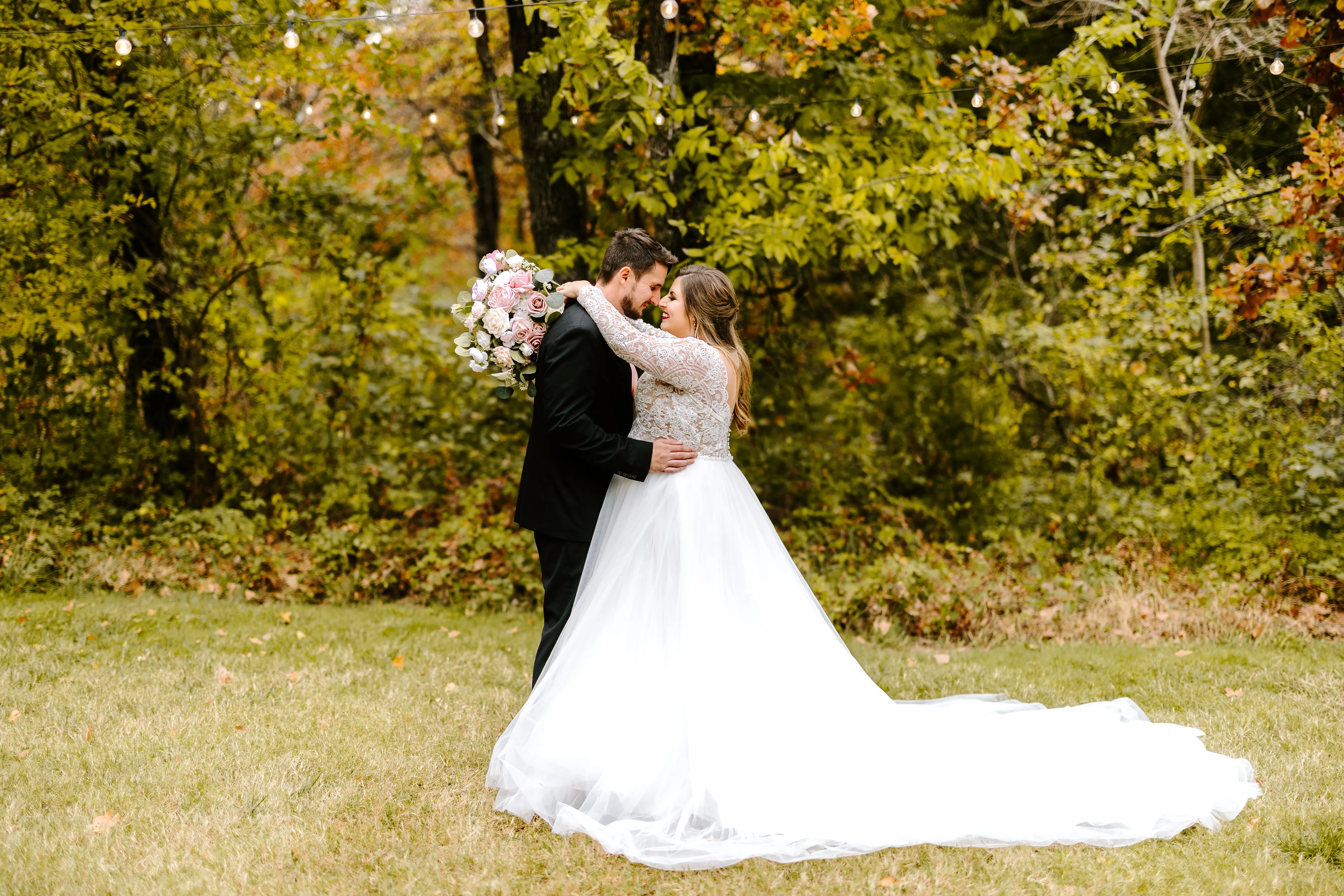 Bride Wearing Princess Wedding Dress Called Mallory Dawn By Maggie Sottero Holding The Groom
