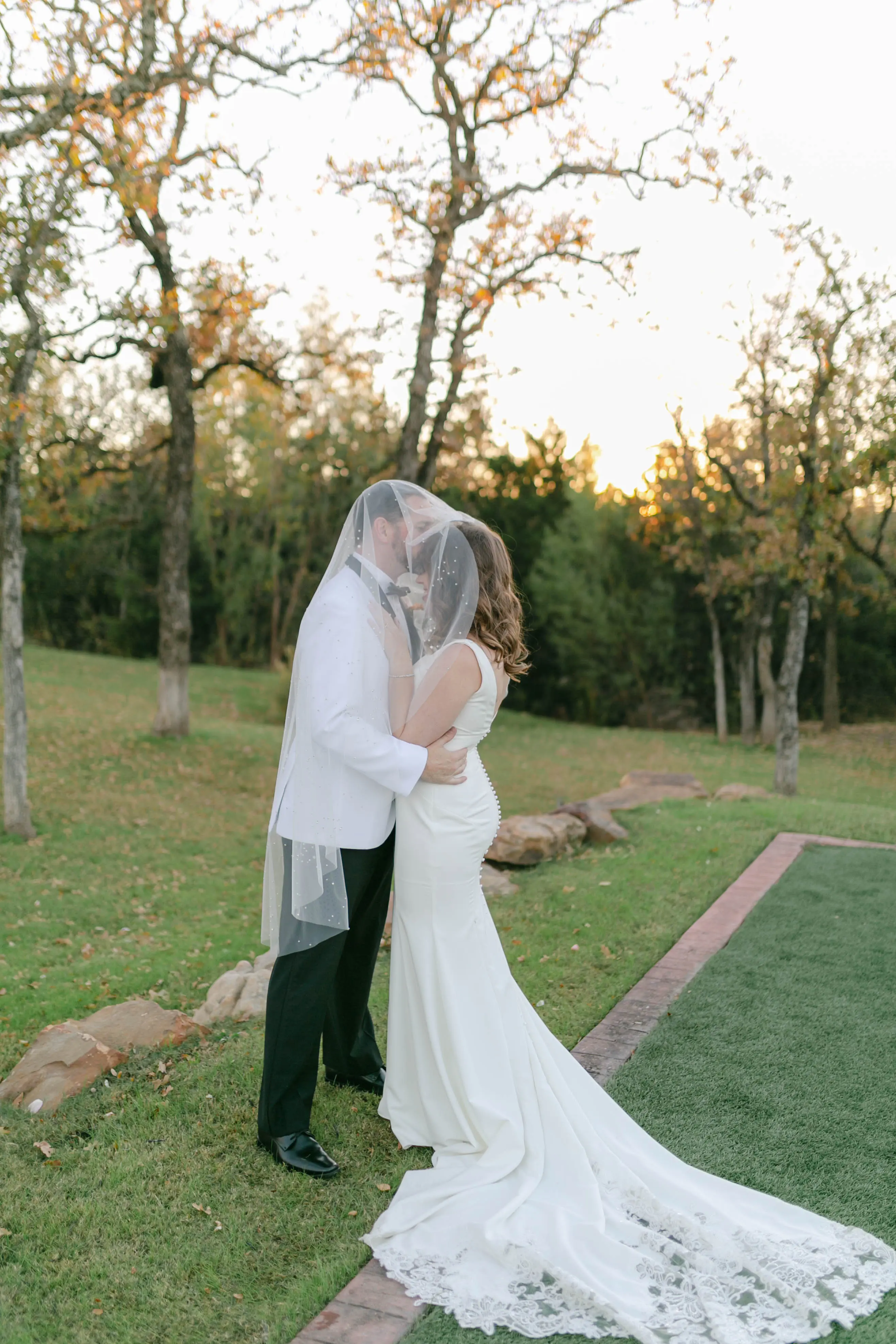 Groom With Bride Wearing Classic Sheath Wedding Dress Alice By Rebecca Ingram