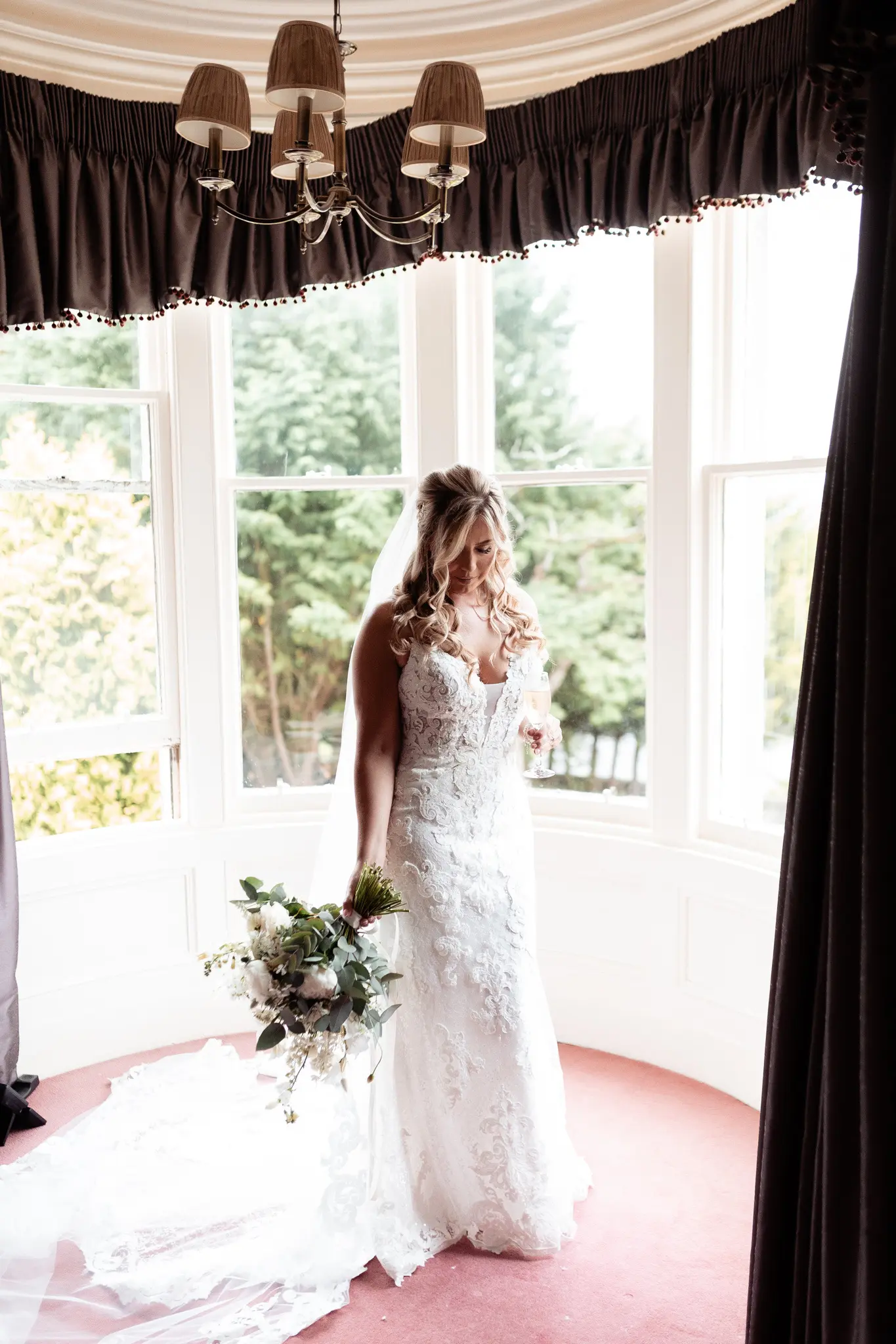 Bride in Romantic Lace Sheath Wedding Gown with Shimmering Lace Motifs Called Tuscany Lynette by Maggie Sottero