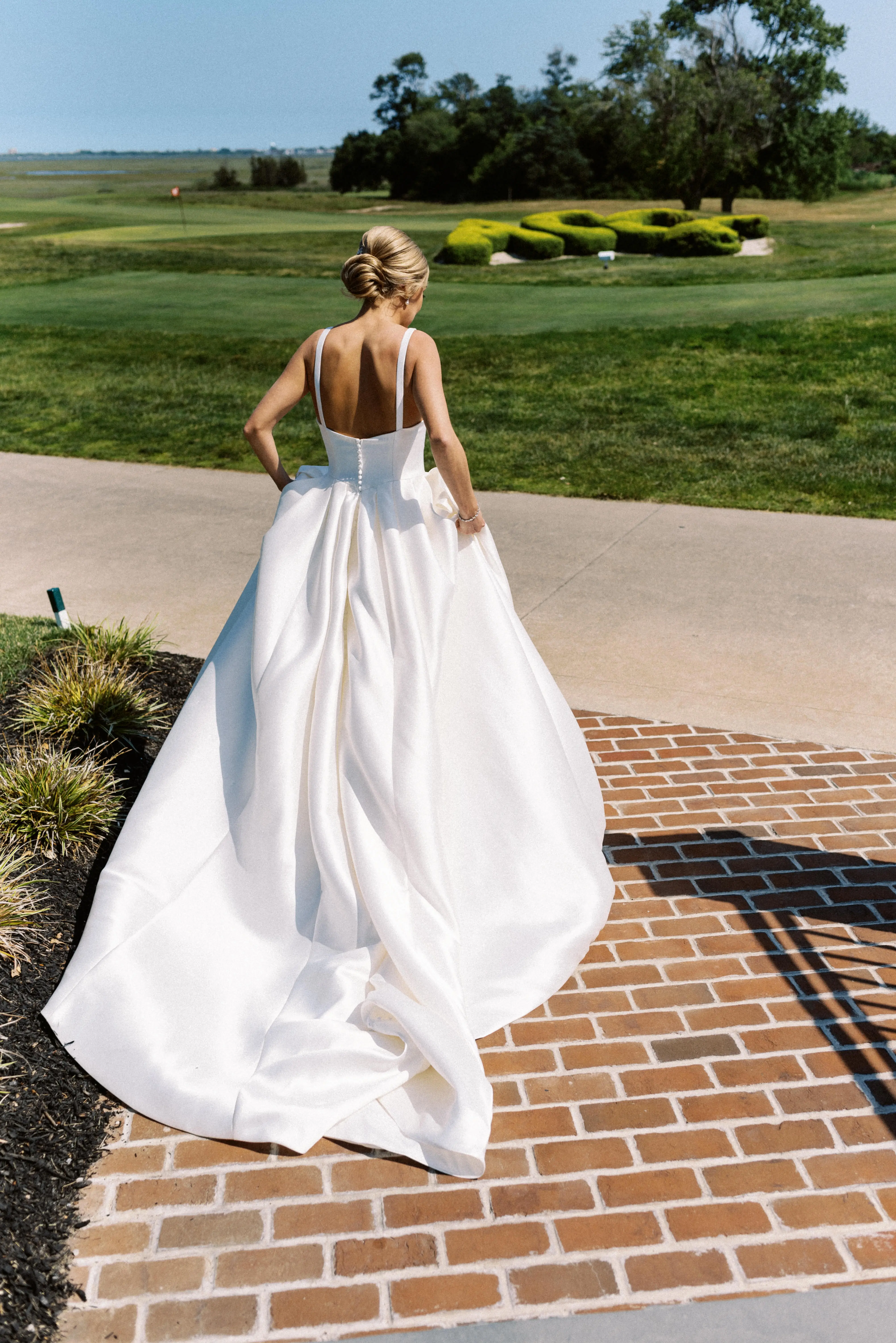 Bride wearing Selena wedding dress by Maggie Sottero