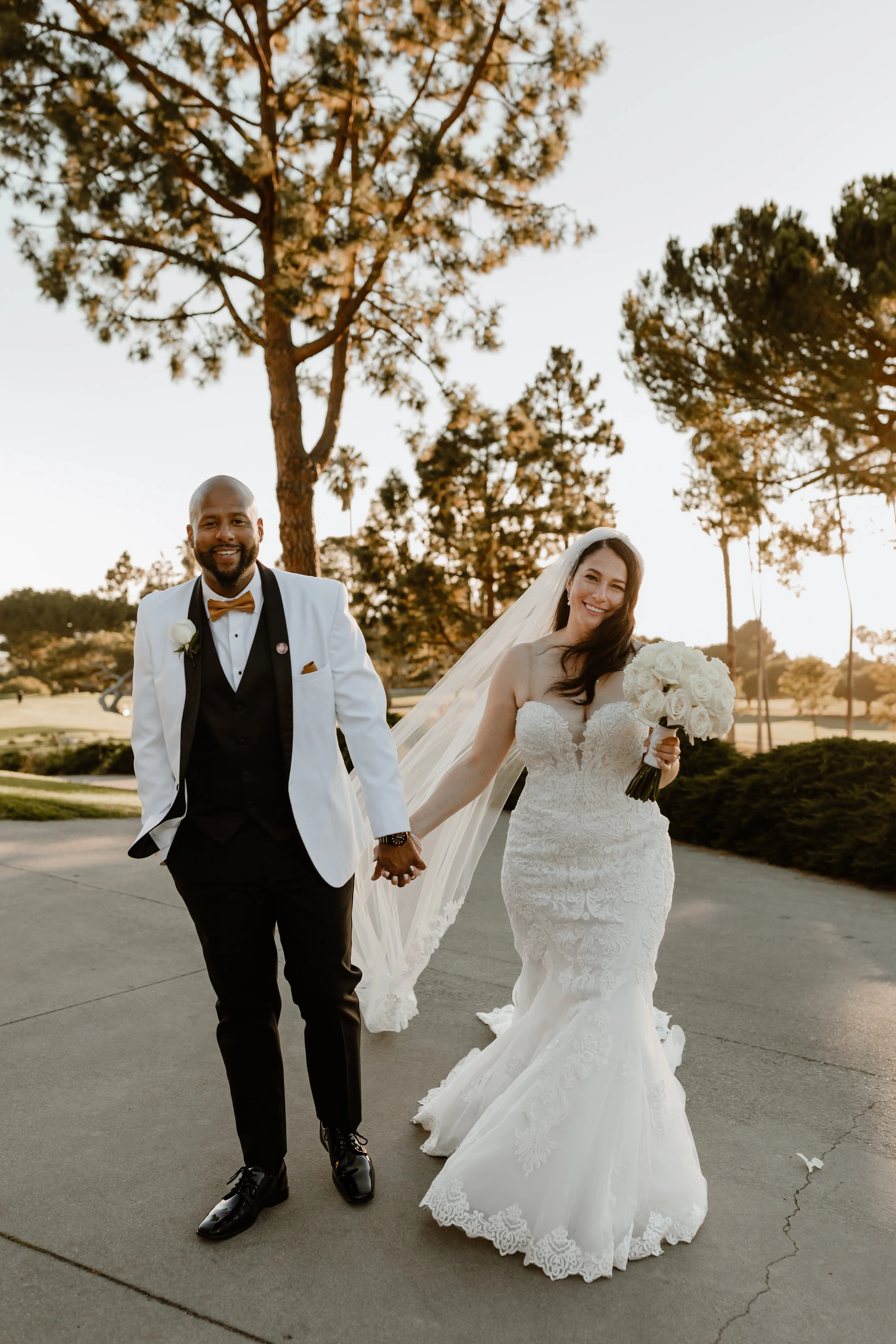 Bride Wearing Lace Wedding Dress Called Fiona By Maggie Sottero At Tropical Venue With Groom In White Suit