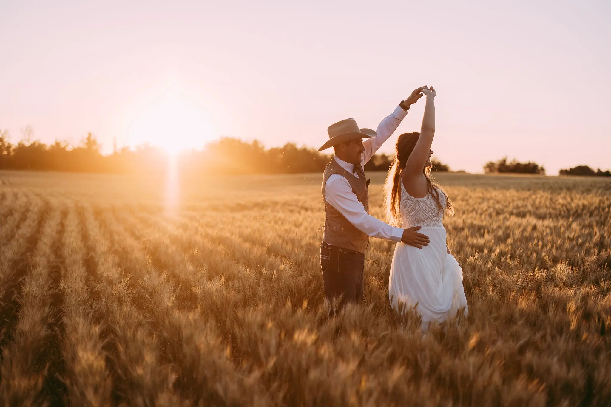 Groom With Bride Wearing Beaded Chiffon Sheath Wedding Dress Lorraine By Rebecca Ingram
