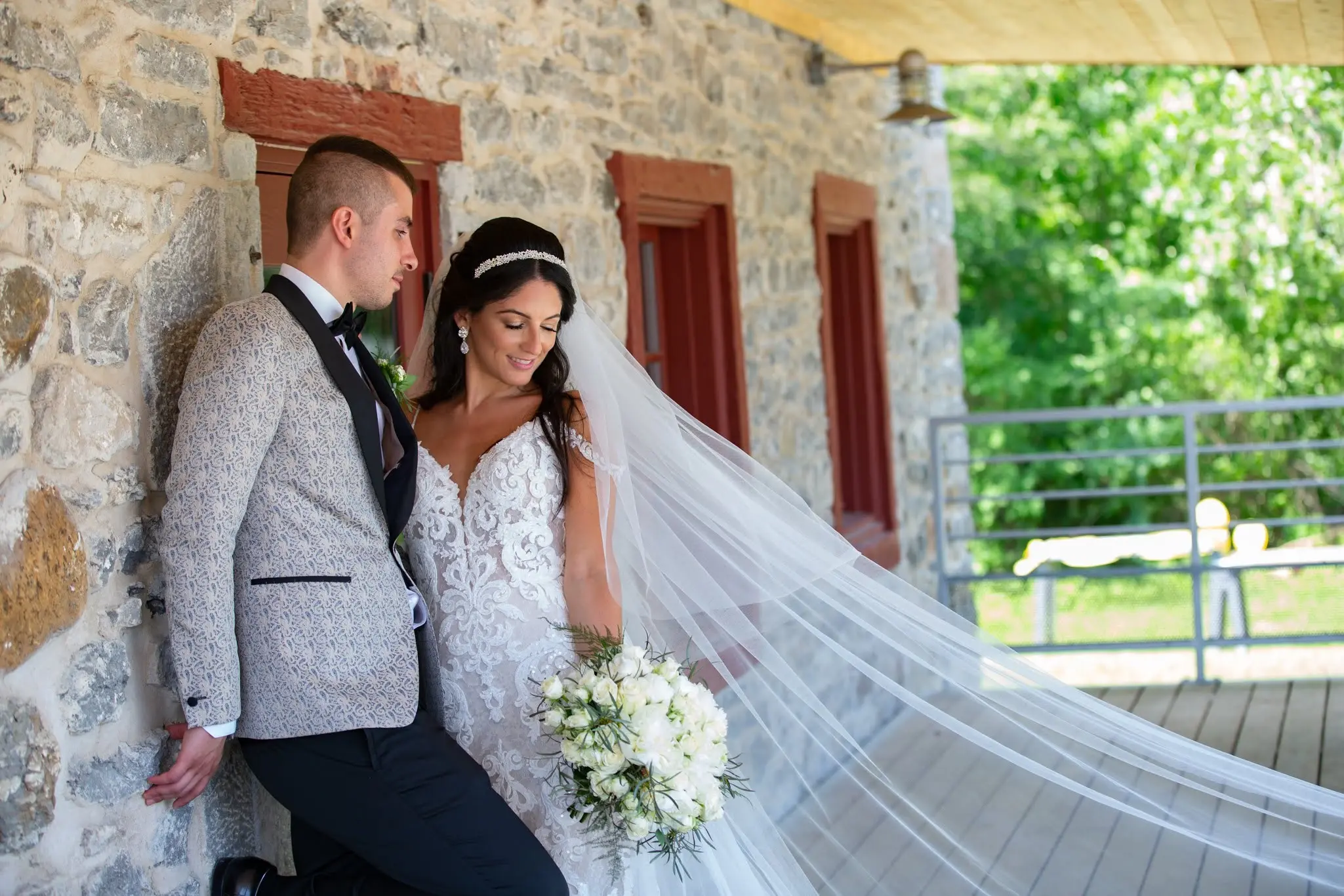 Bride Wearing Lace Sheath Wedding Dress Called Tuscany Lynette By Maggie Sottero With Groom