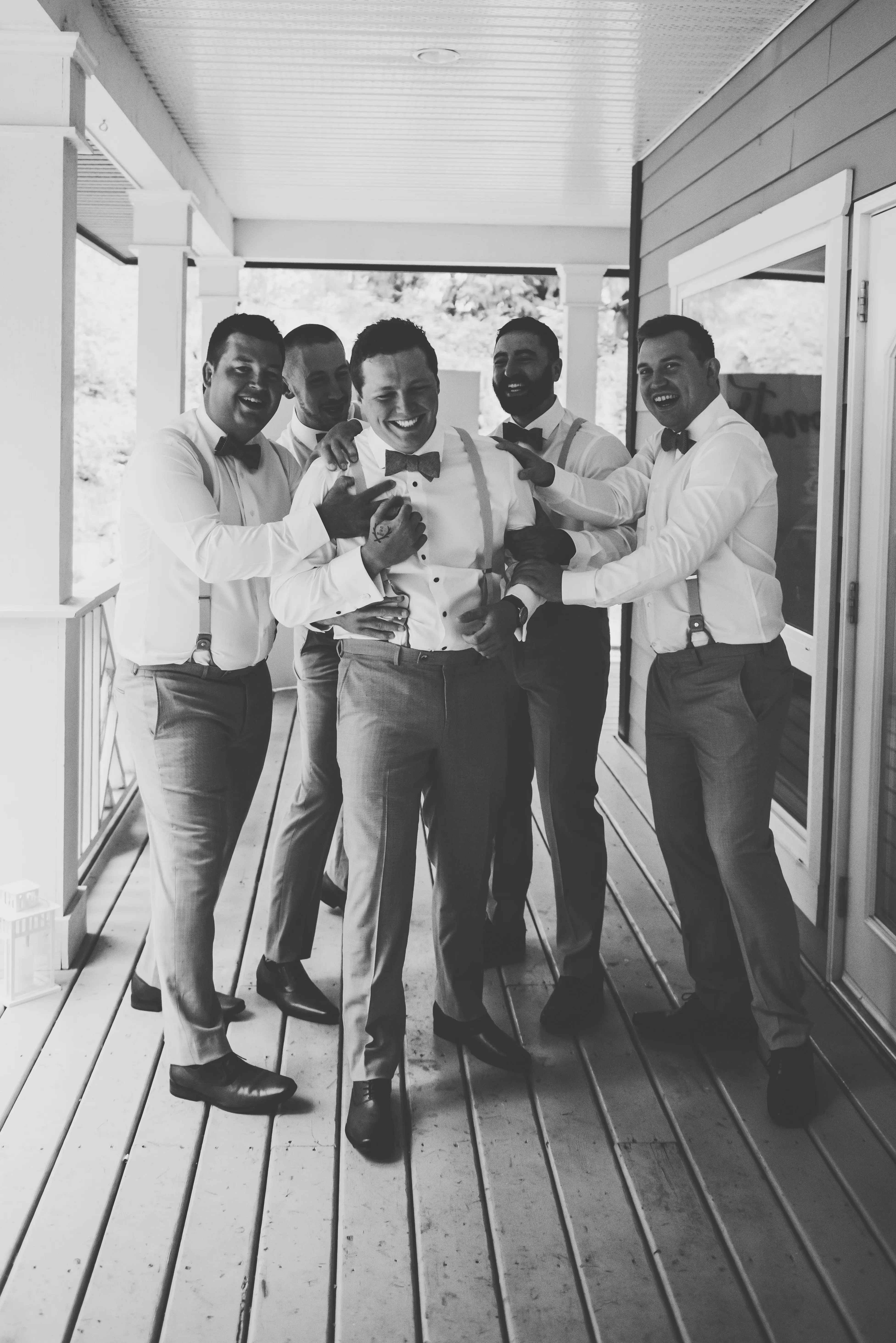 Groomsmen Wearing Bowties And Suspenders