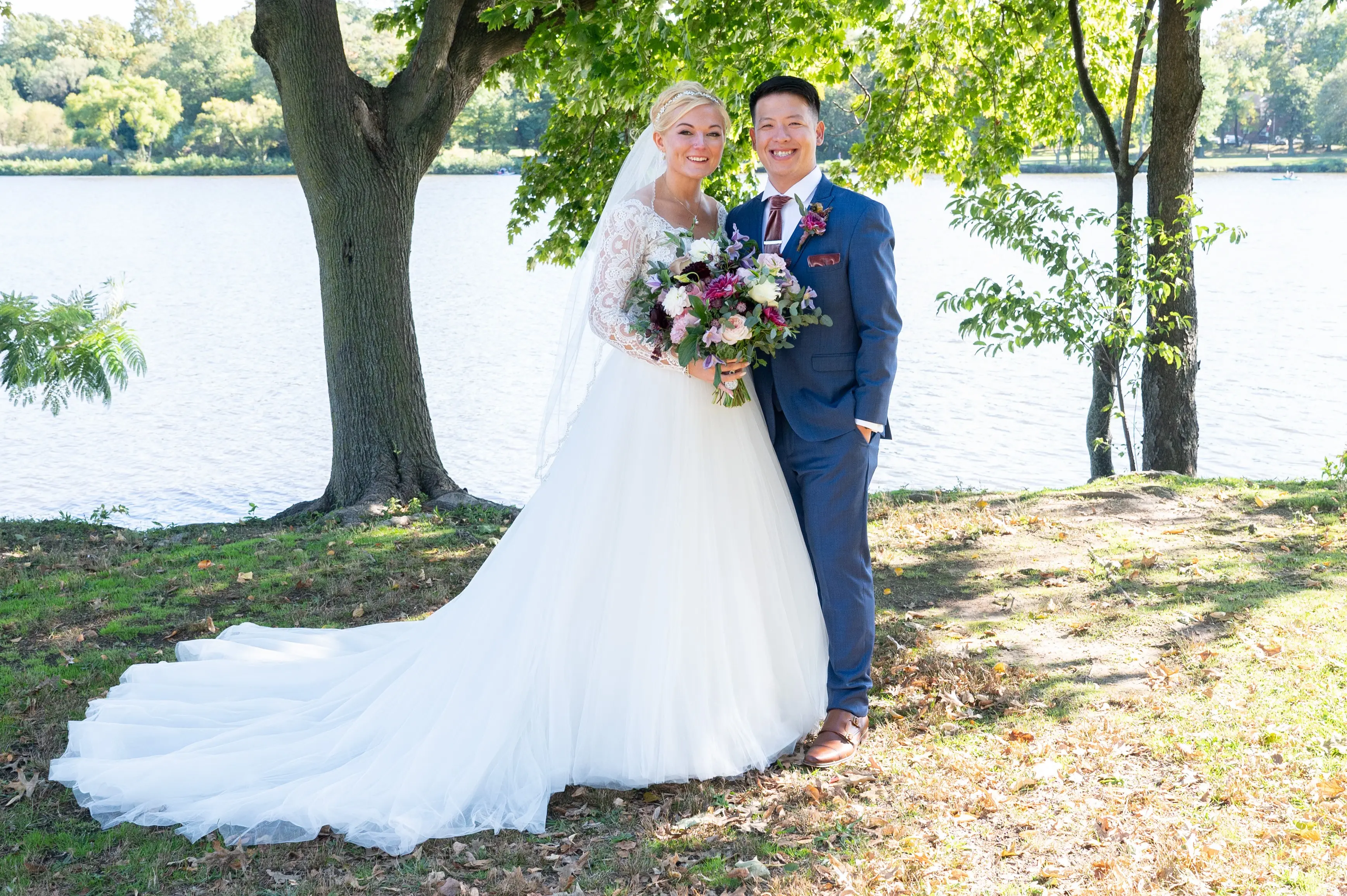 Bride Wearing Princess Ballgown Wedding Dress Called Mallory Dawn By Maggie Sottero With Groom By A Lake