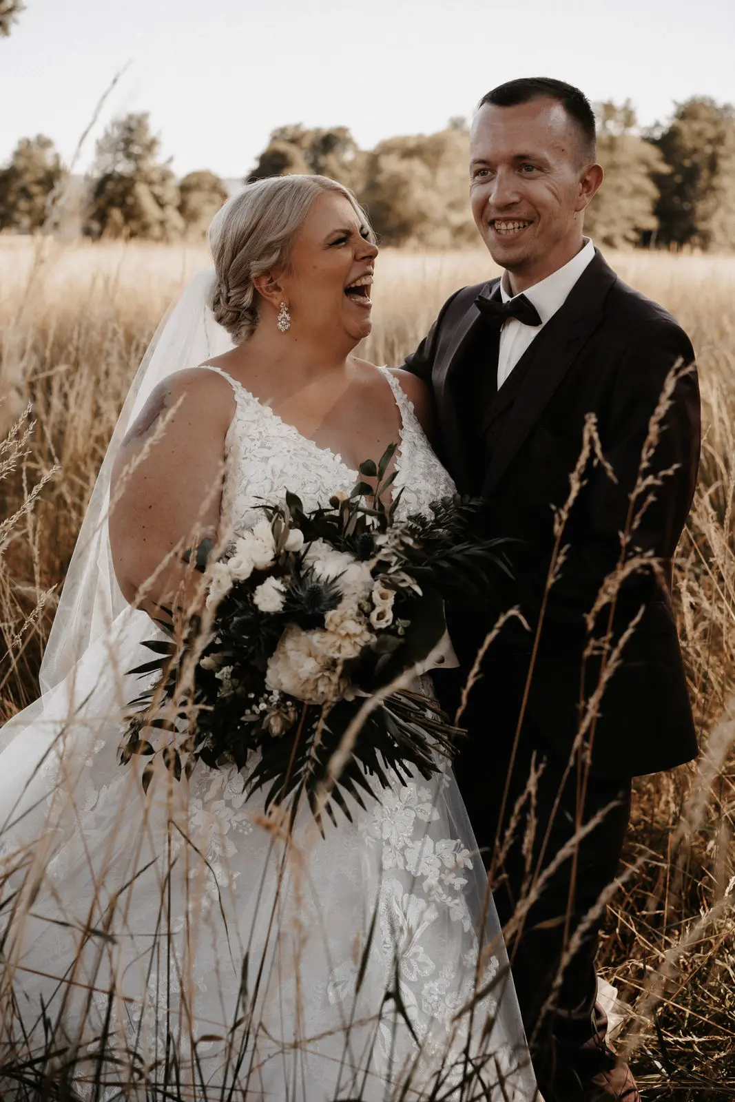 Groom With Bride Wearing Ball Gown With Shimmery Lace Motifs Valona By Sottero And Midgley