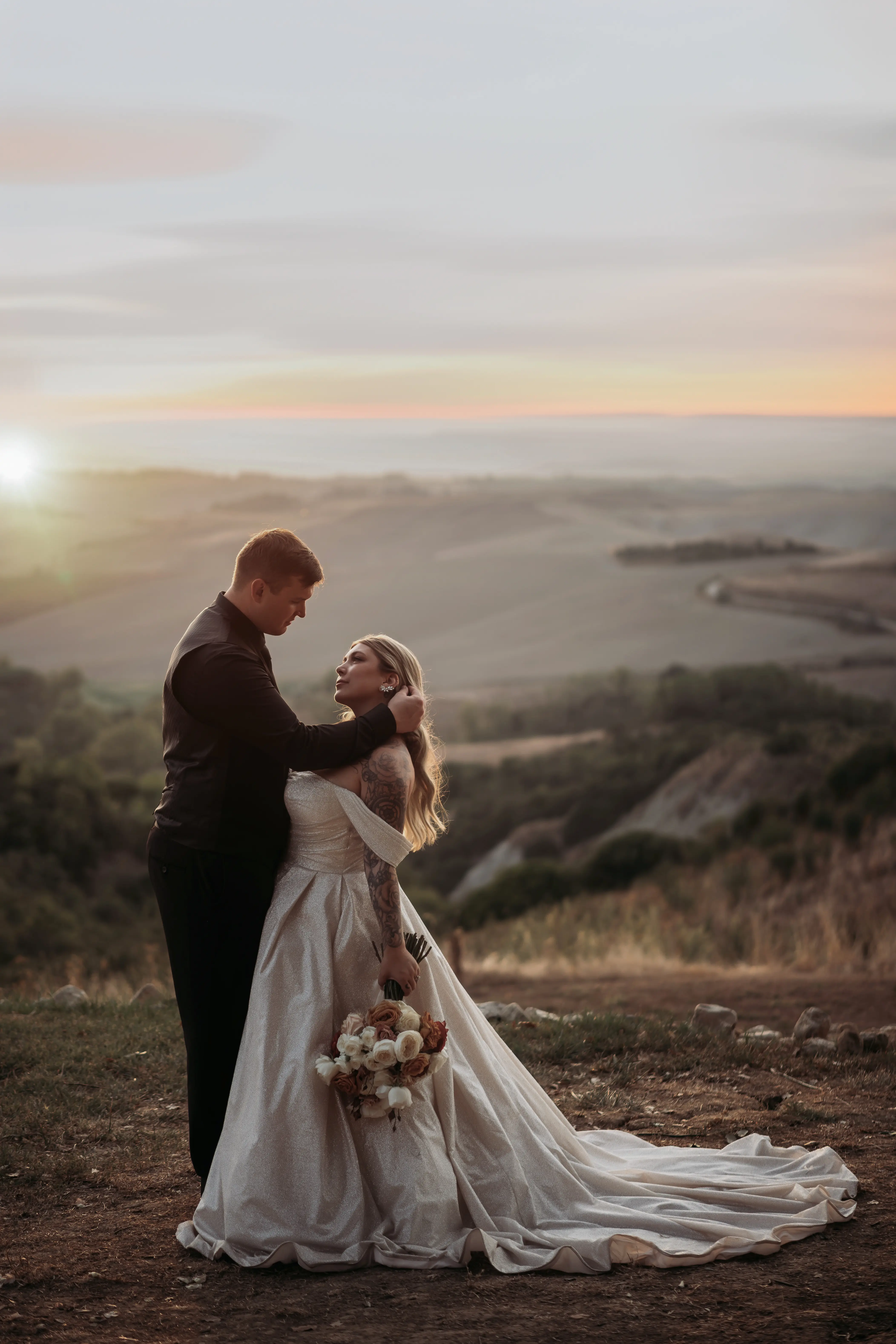 Bride wearing Anniston by Maggie Sottero with her husband