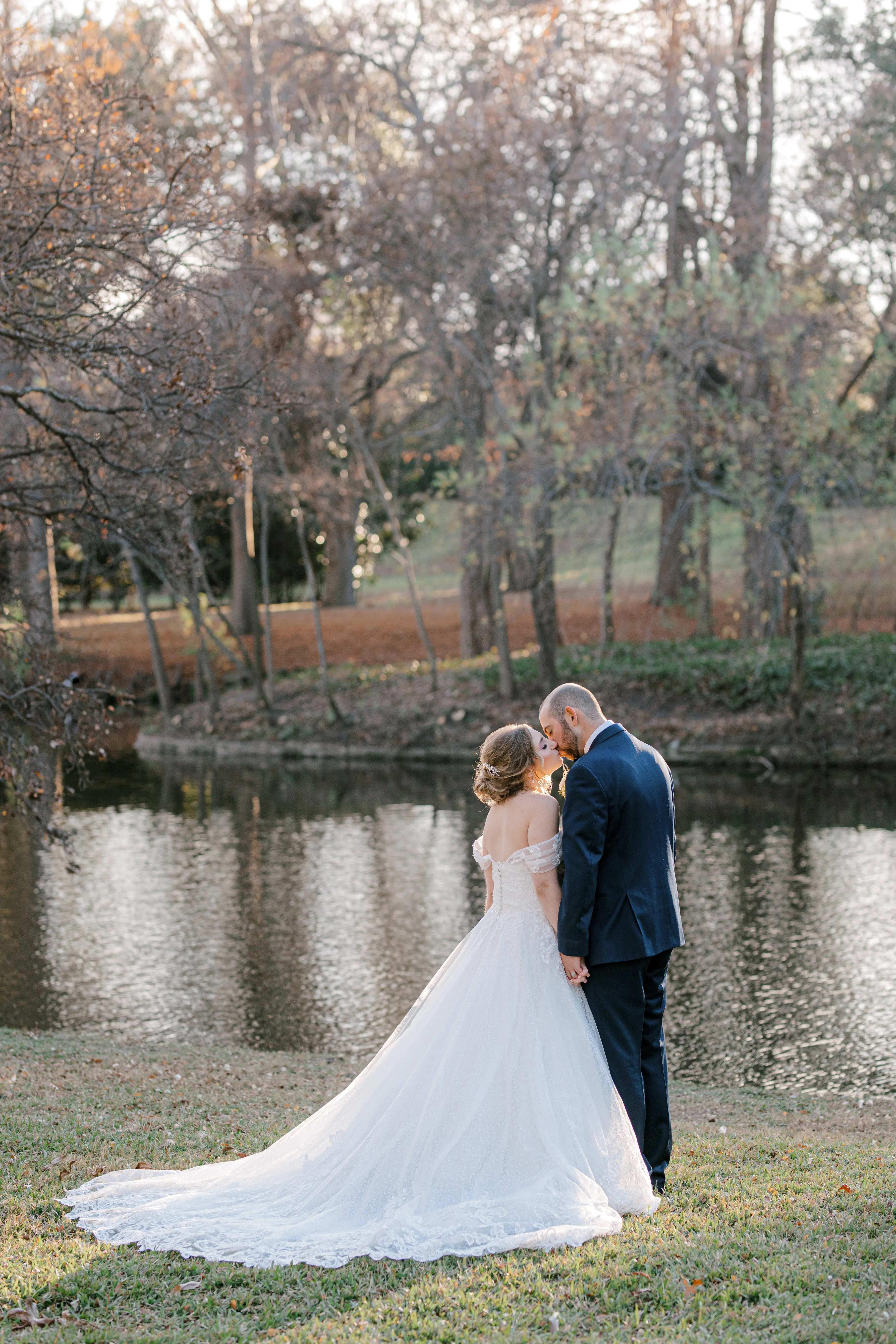 Groom Kissing Bride In Chic Lace Ball Gown Wedding Dress Called Tristyn By Maggie Sottero