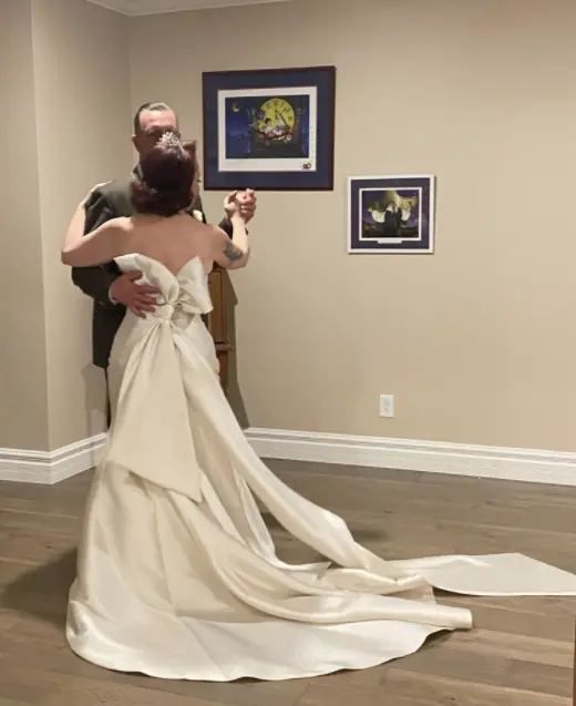 Bride Wearing Classic Simple Wedding Dress Called Mitchell By Maggie Sottero Dancing With The Groom