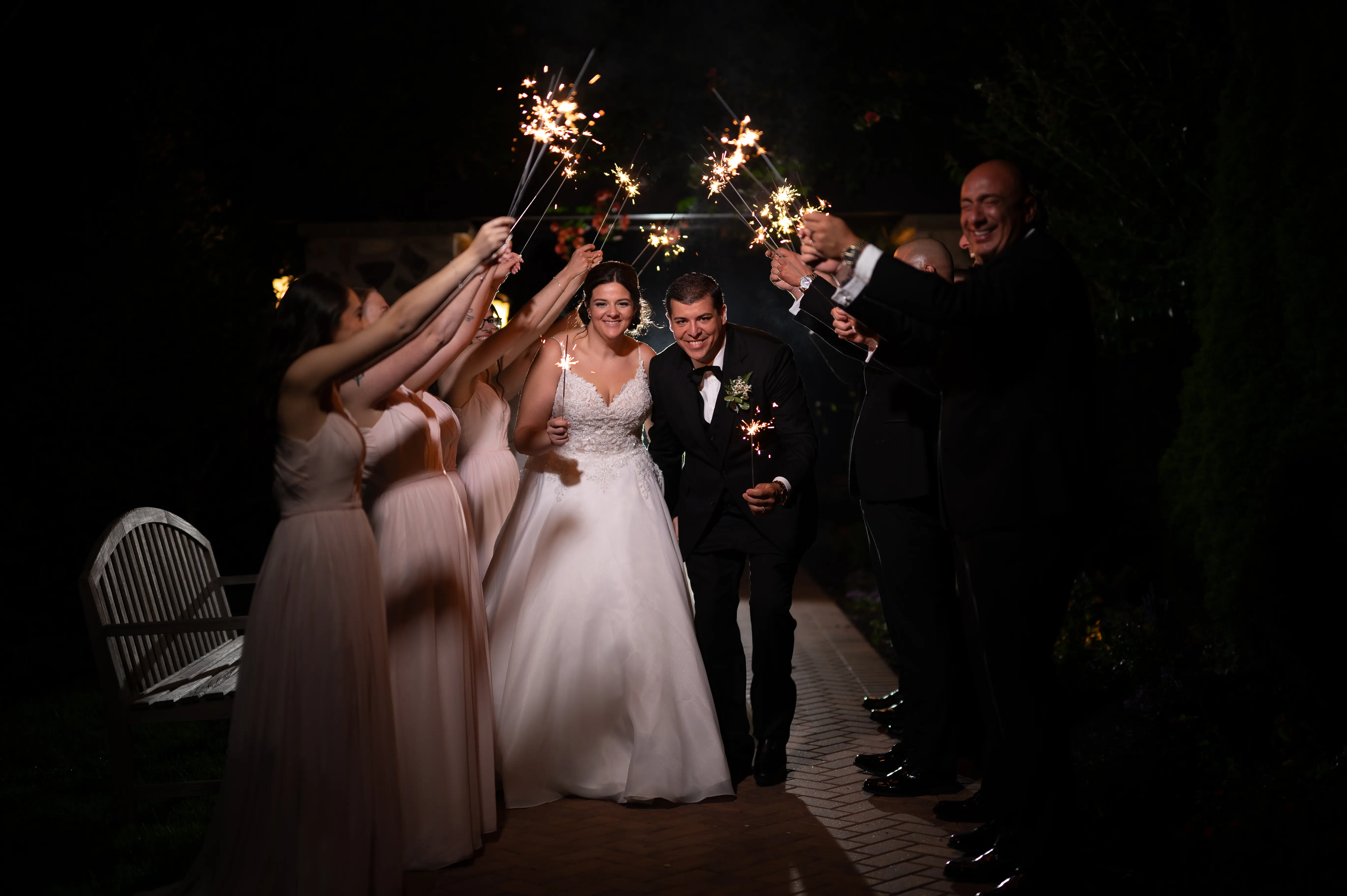Bride In A-line Wedding Dress Named Savannah By Maggie Sottero Bride And Groom Leaving Reception