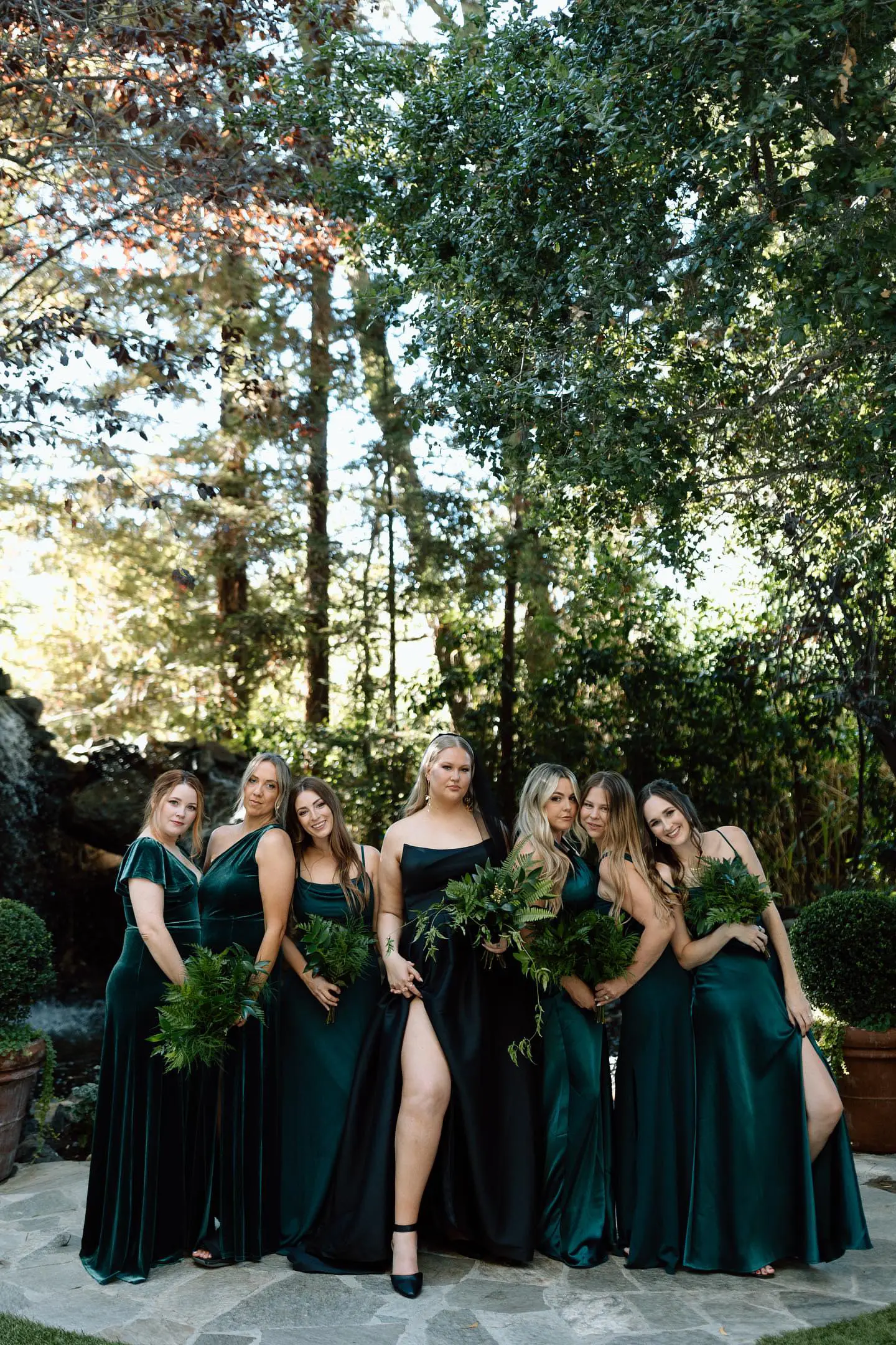 Bride wearing Aspen wedding dress by Sottero and Midgley with her bridesmaids