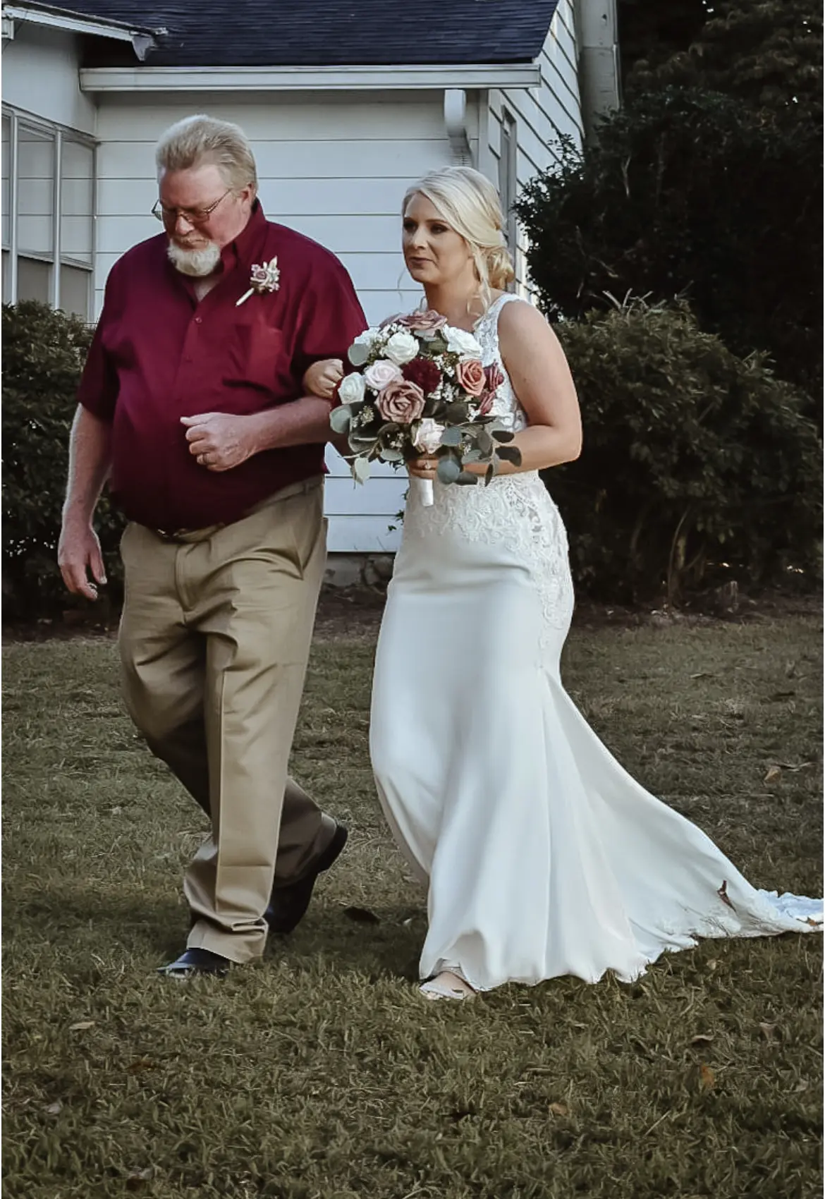 Father and Bride Walking Down the Aisle Wearing Aidan Lace Sheath Bridal Dress Called Aidan By Maggie Sottero